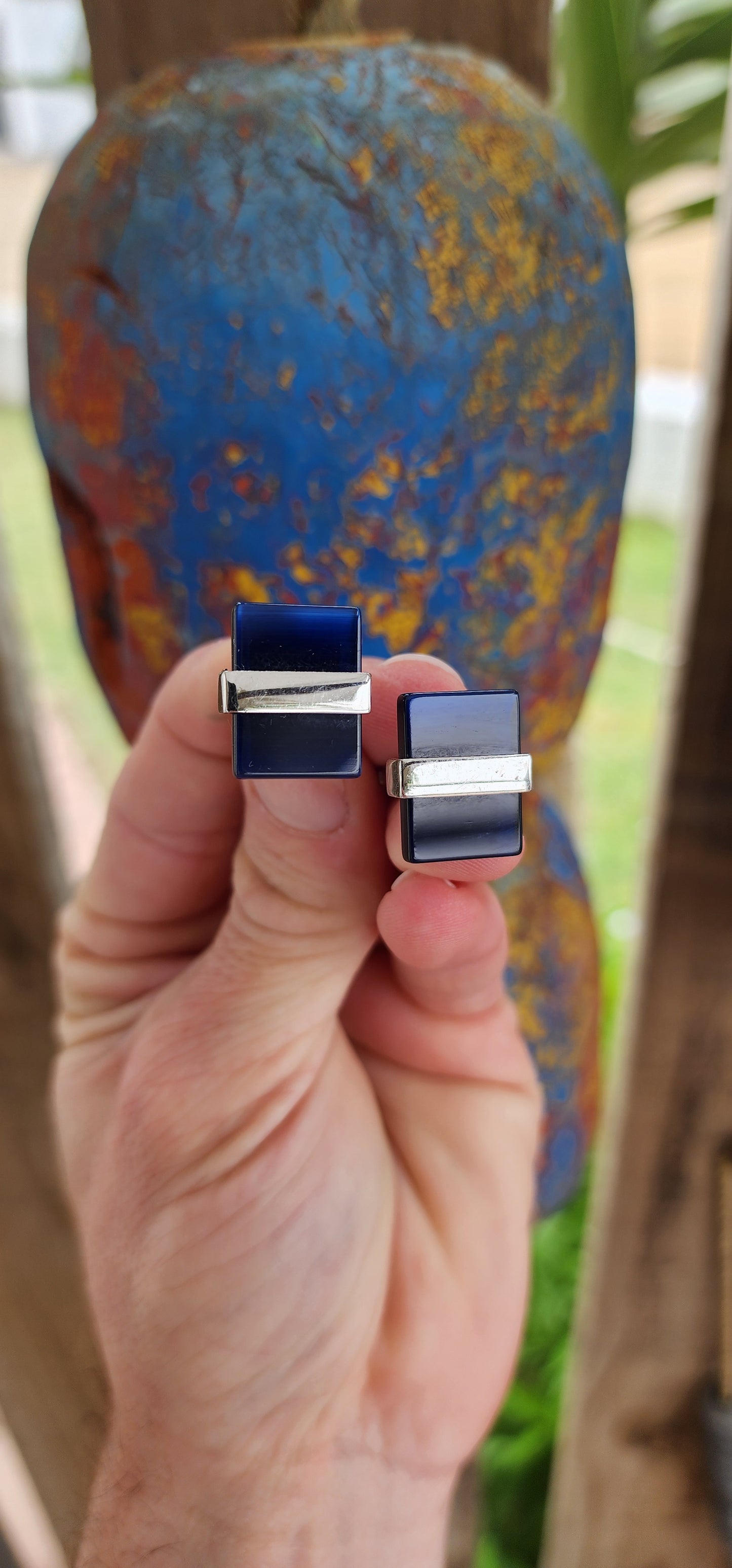 Two pairs of stainless steel and glass components cufflinks, elegantly designed in a art deco style.