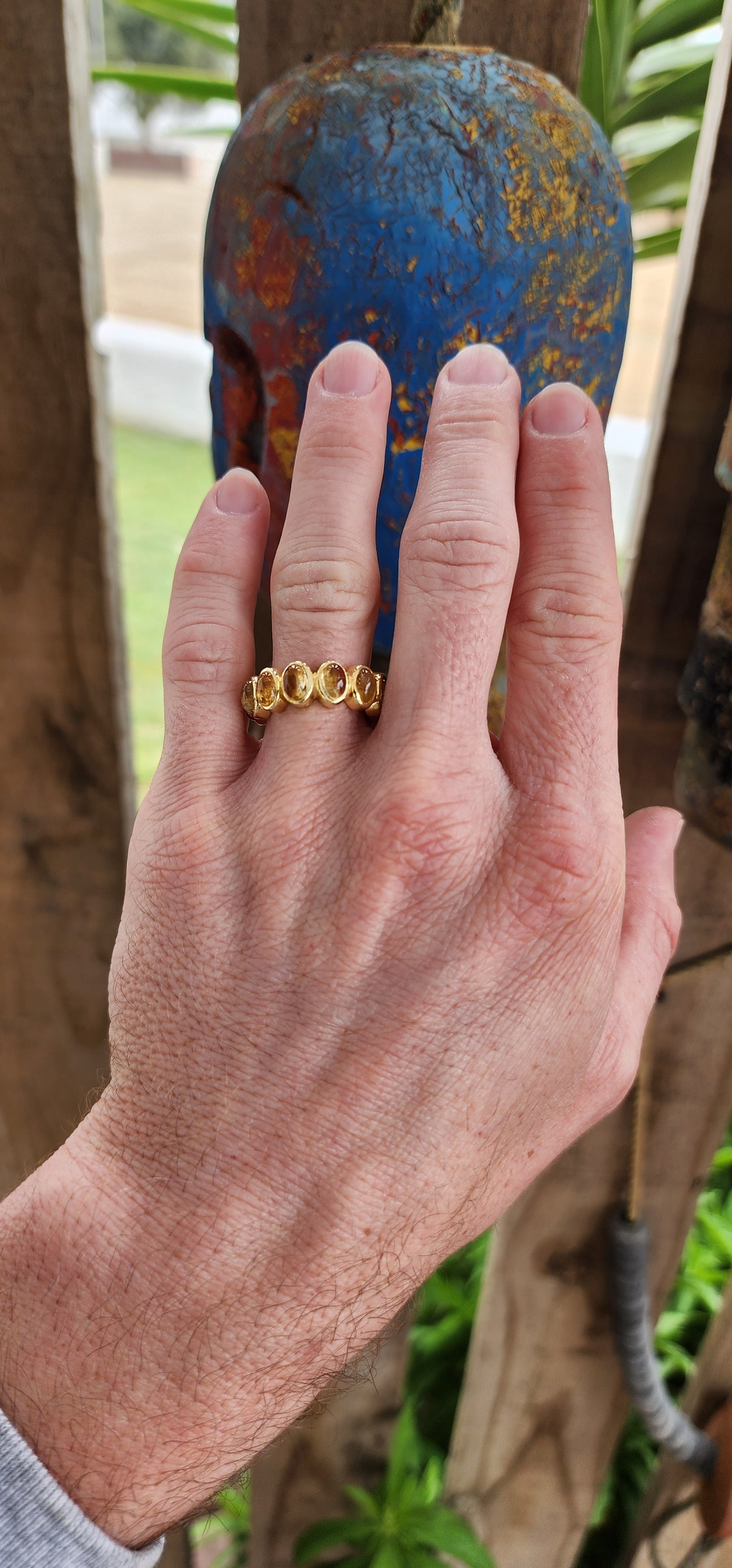 This exquisite ring is like a mystical relic from a forgotten age, handcrafted with sterling silver and bathed in the radiant glow of 22ct yellow gold plating.