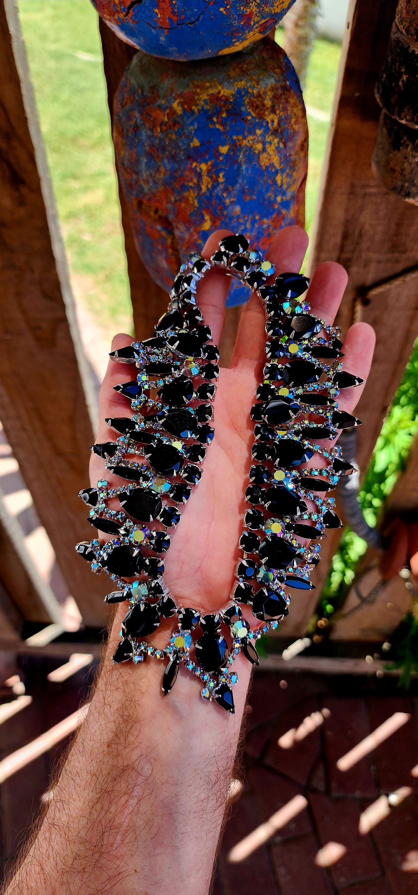 A truly exceptional and highly sought-after vintage treasure, this magnificent 1960s Juliana (DeLizza & Elster) bib necklace embodies bold mid-century glamour at its finest.