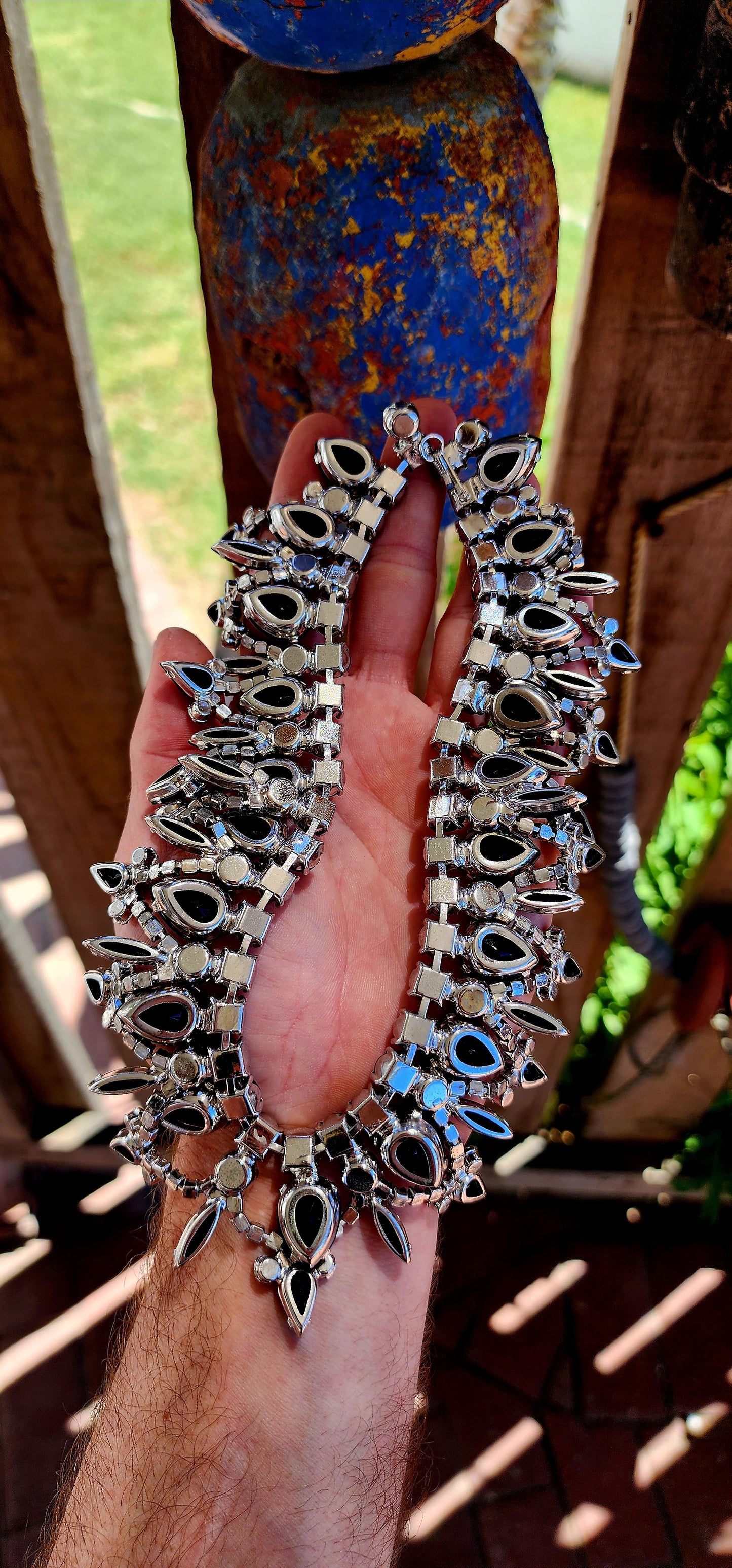A truly exceptional and highly sought-after vintage treasure, this magnificent 1960s Juliana (DeLizza & Elster) bib necklace embodies bold mid-century glamour at its finest.