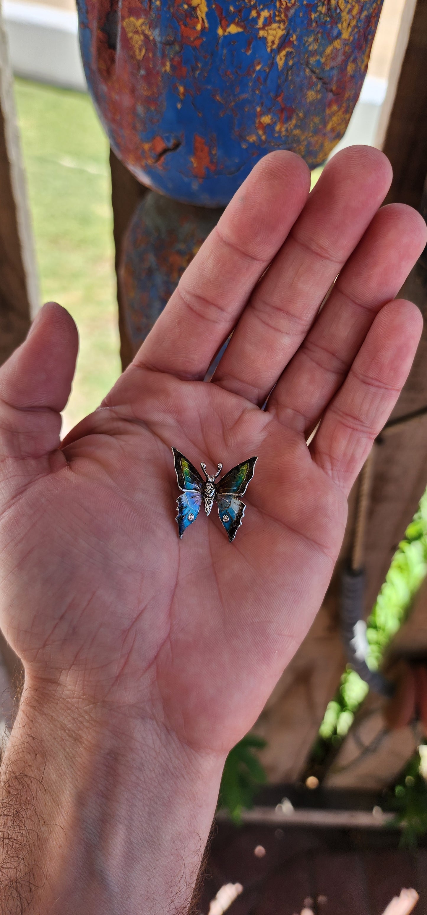 This vintage sterling silver butterfly brooch is a breathtaking work of art, brimming with character and charm. Made in Germany, it showcases the fine craftsmanship and attention to detail characteristic of classic European jewelry.