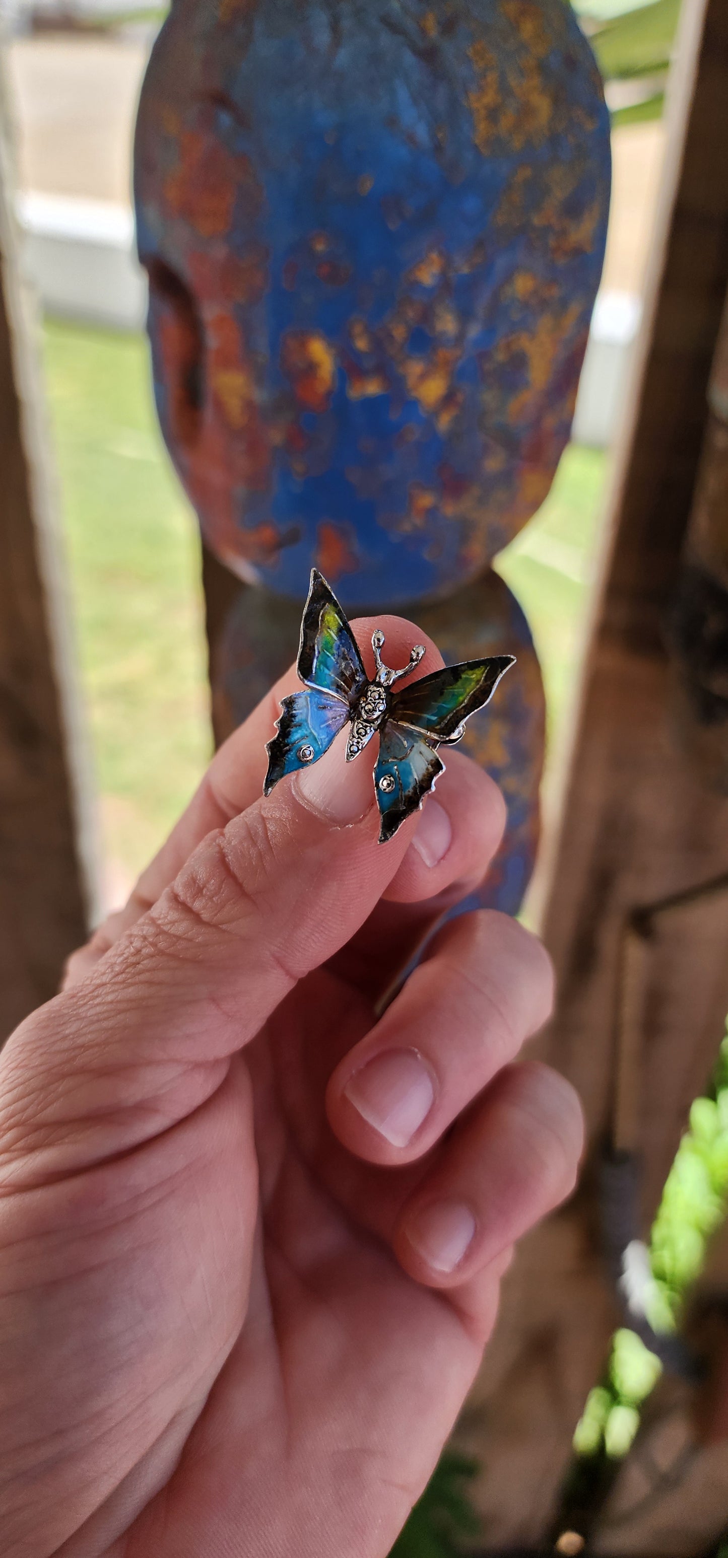 This vintage sterling silver butterfly brooch is a breathtaking work of art, brimming with character and charm. Made in Germany, it showcases the fine craftsmanship and attention to detail characteristic of classic European jewelry.