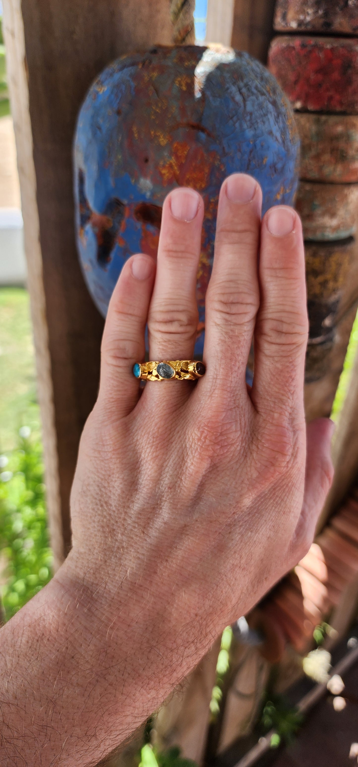 This is a dazzling unisex creation that seems almost born of alchemy rather than human hands. The ring is a brutalist-style masterpiece, its bold and organic form reminiscent of a treasure unearthed from an ancient, enchanted kingdom.