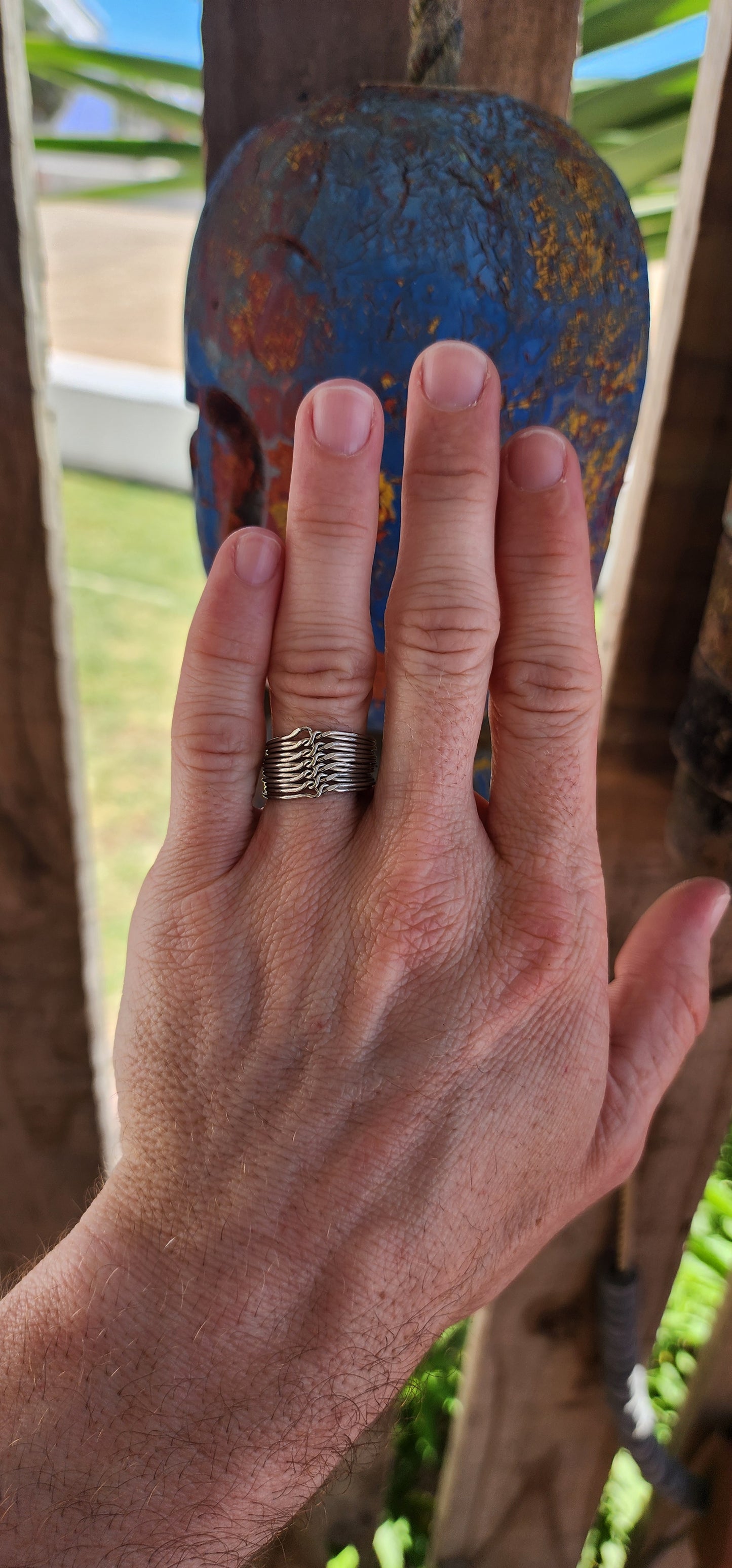 Vintage sterling silver 12-band interlocking puzzle ring, an intricate piece of jewelry with a long history and deep cultural significance.