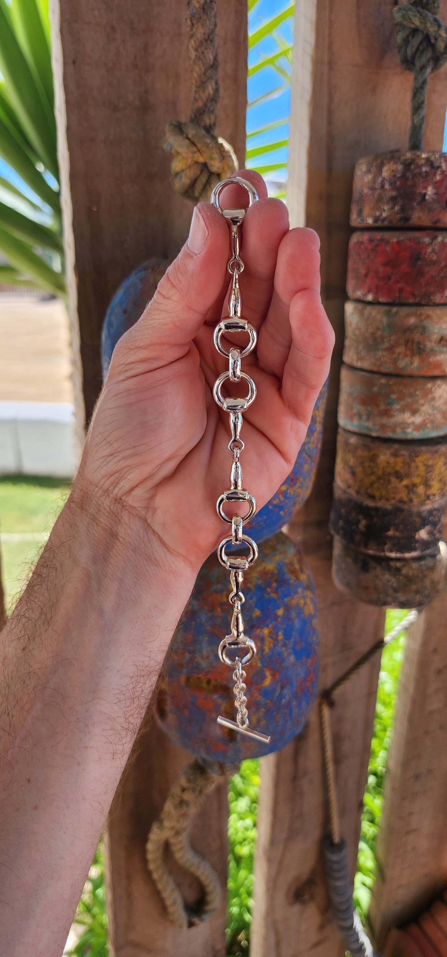 This bracelet is the ultimate showstopper for equestrian enthusiasts and lovers of bold, timeless jewelry. Crafted from chunky, weighty solid sterling silver, it features an intricate design inspired by horse snaffle bits.