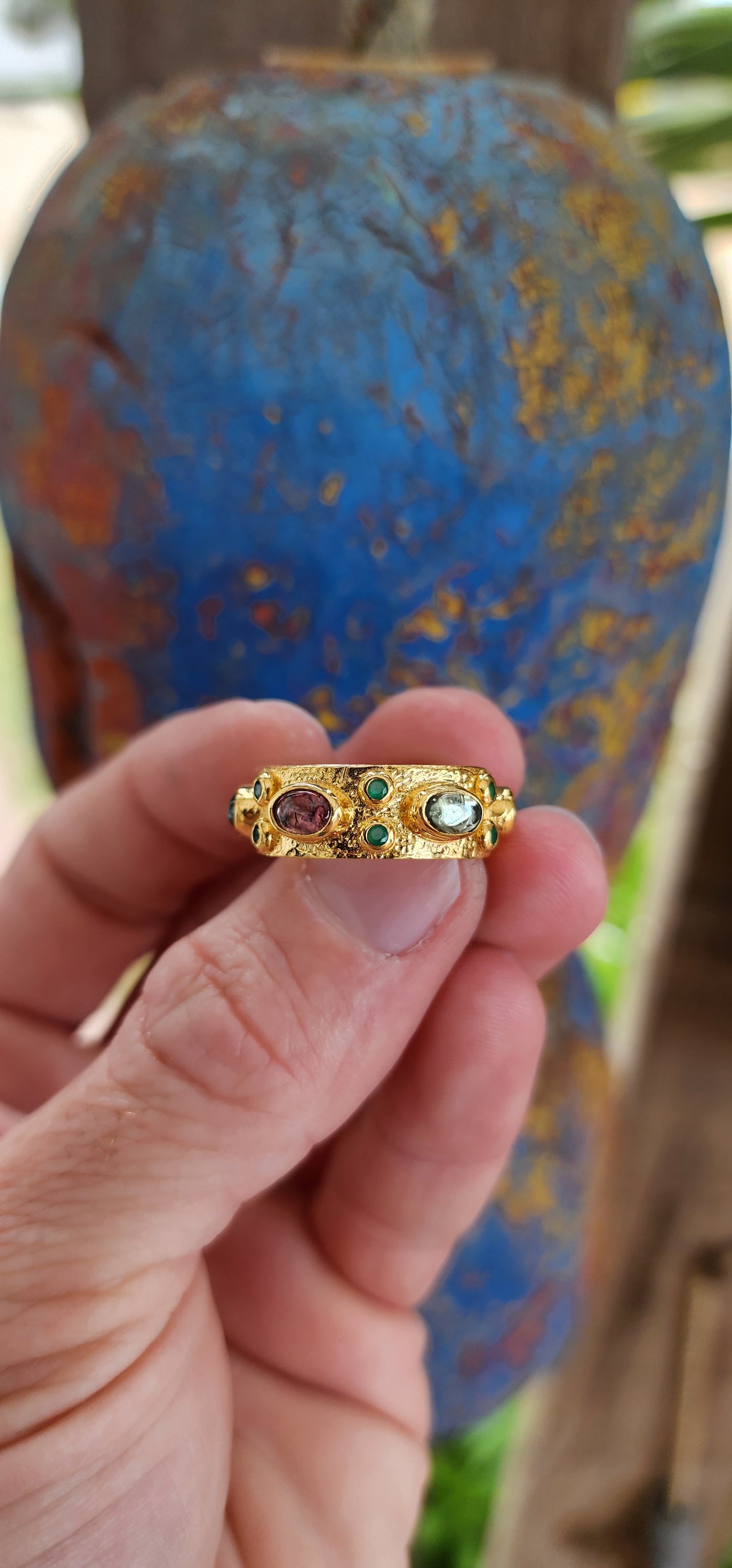 This handmade sterling silver eternity style ring is like a little party on your finger! Its 22ct gold-plated band shines with a joyful, sunlit glow, as if it’s been basking in golden hour forever.