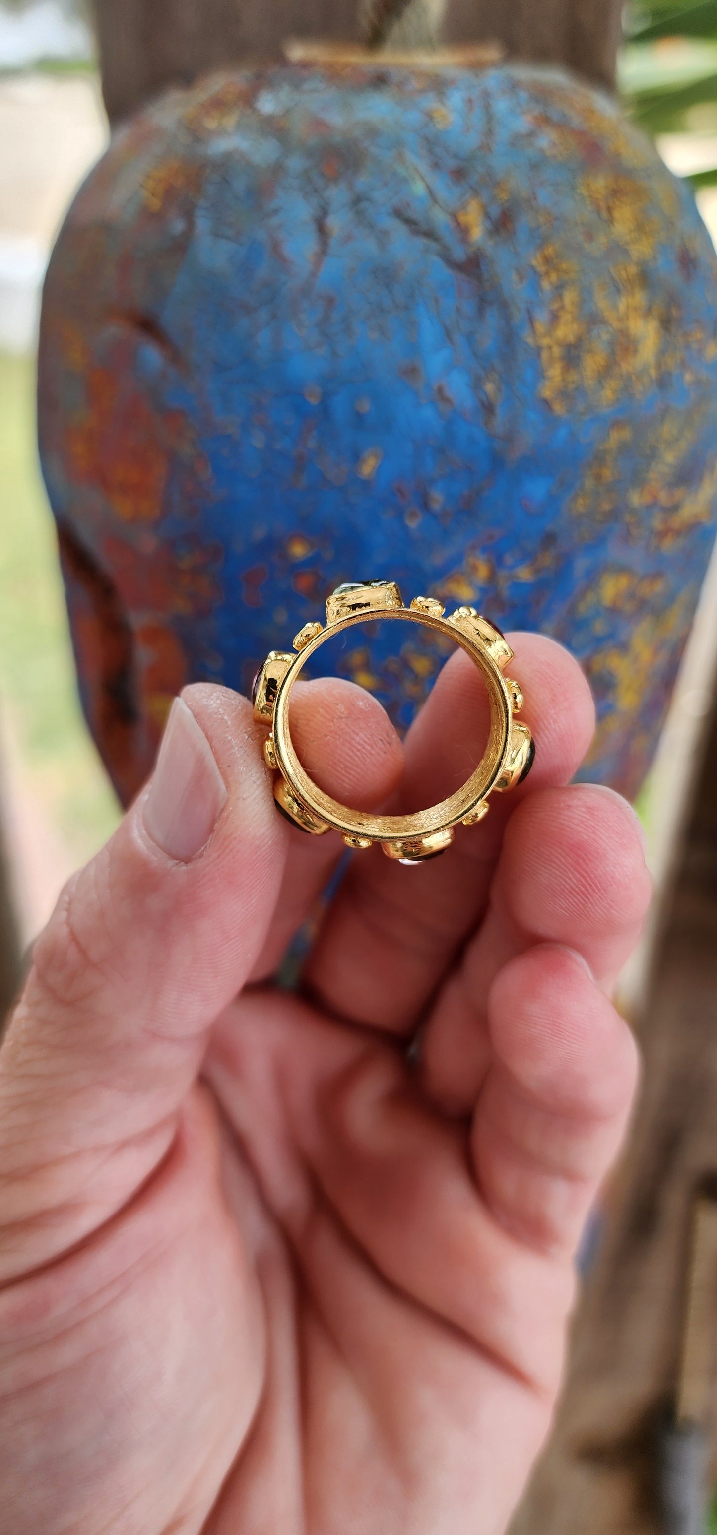 This handmade sterling silver eternity style ring is like a little party on your finger! Its 22ct gold-plated band shines with a joyful, sunlit glow, as if it’s been basking in golden hour forever.