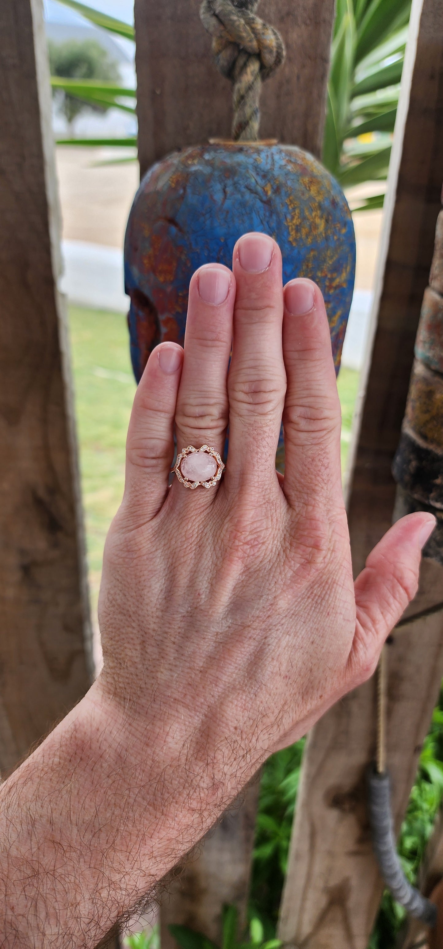 This breathtaking ring is a masterpiece of refined artistry, worthy of royalty. Crafted from sterling silver with a luxurious rose gold plating, it exudes warmth and grace, embodying the delicate balance of opulence and understated elegance.