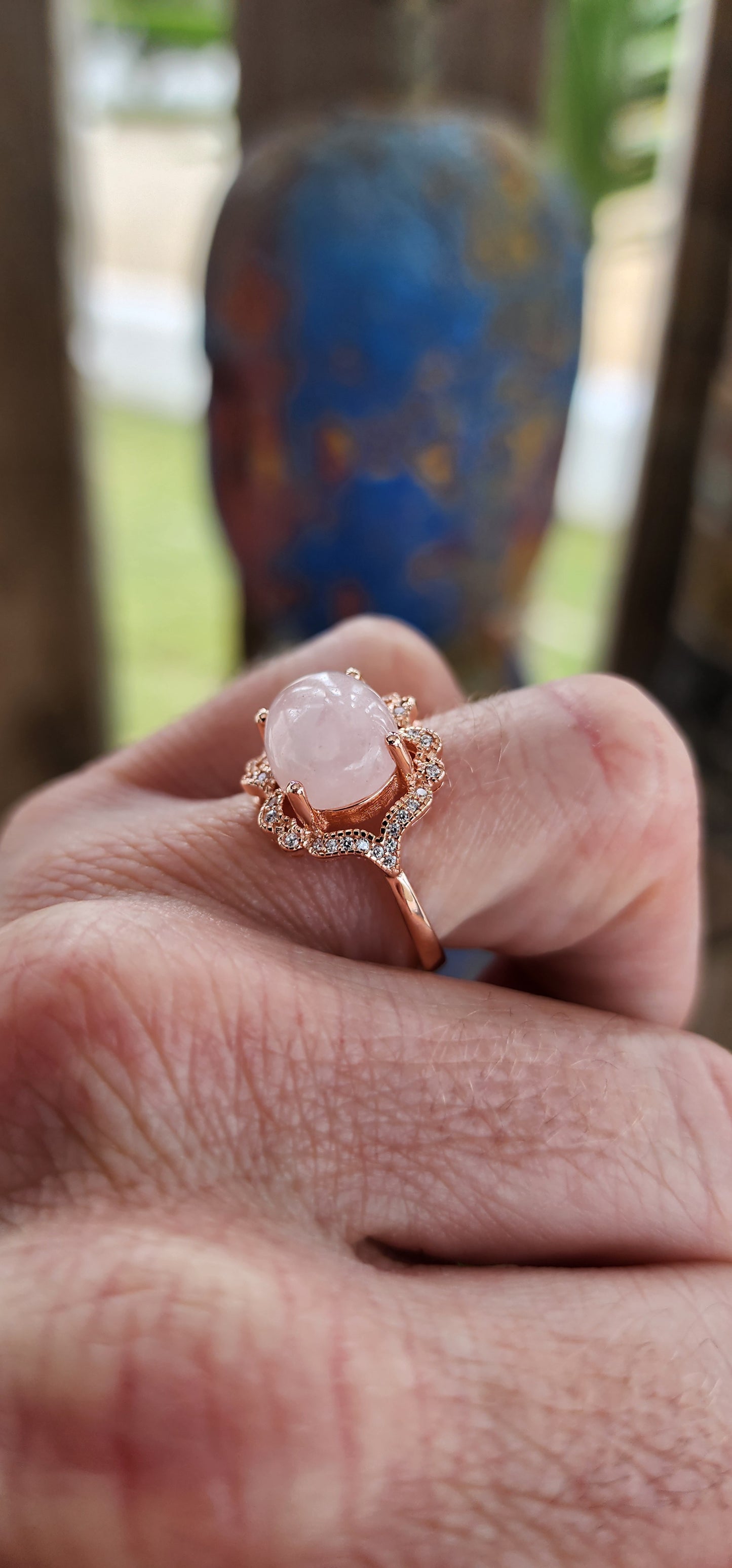 This breathtaking ring is a masterpiece of refined artistry, worthy of royalty. Crafted from sterling silver with a luxurious rose gold plating, it exudes warmth and grace, embodying the delicate balance of opulence and understated elegance.