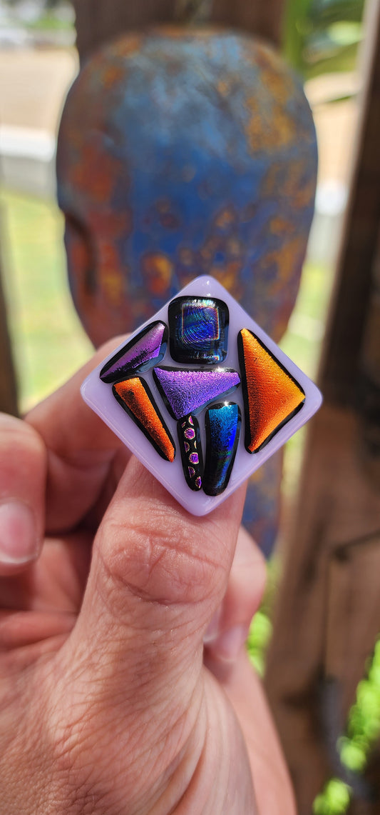 This vintage designer modernist Dichroic glass brooch by Svenson is a bold celebration of art and color.