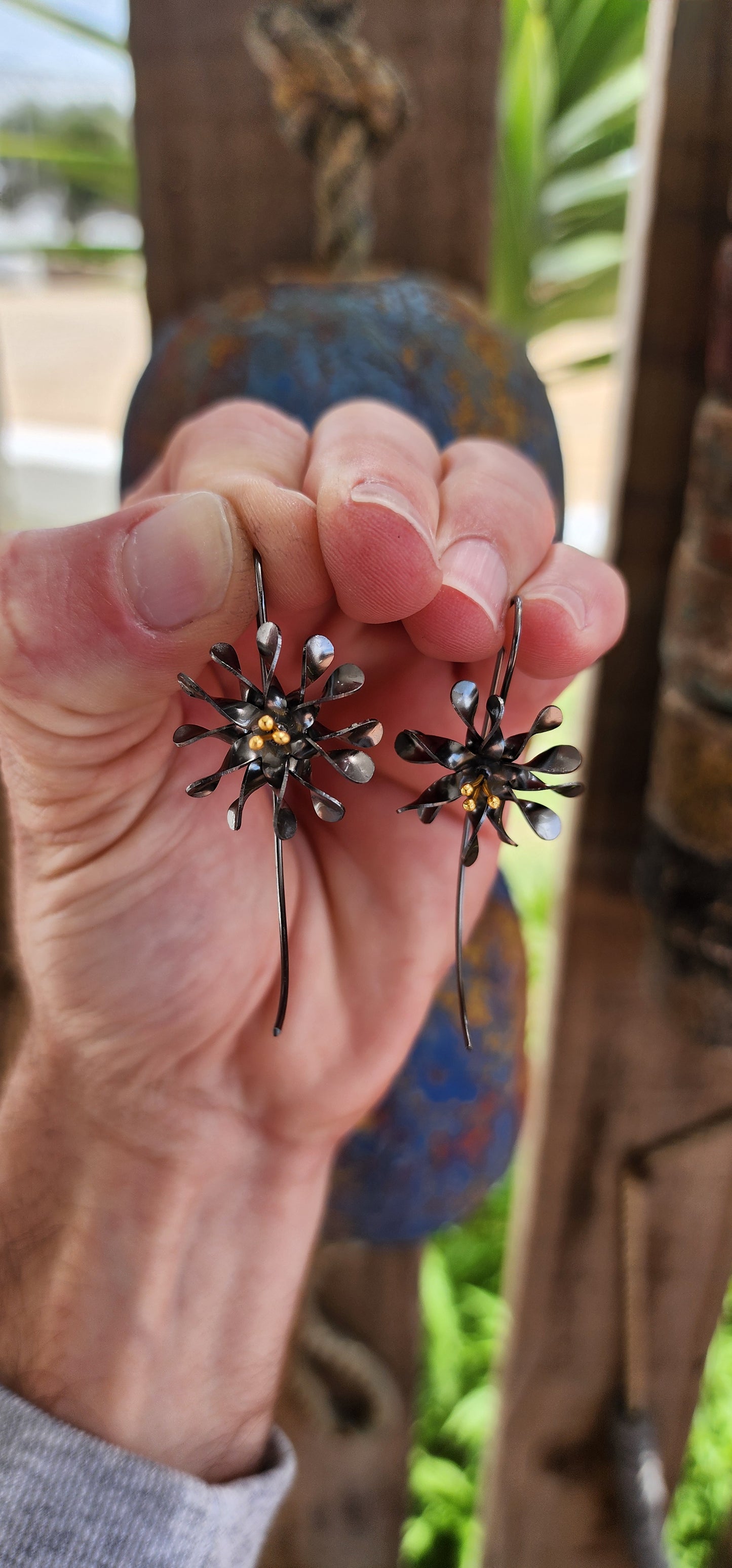 These stunning artisan-crafted earrings are a wearable botanical dream!