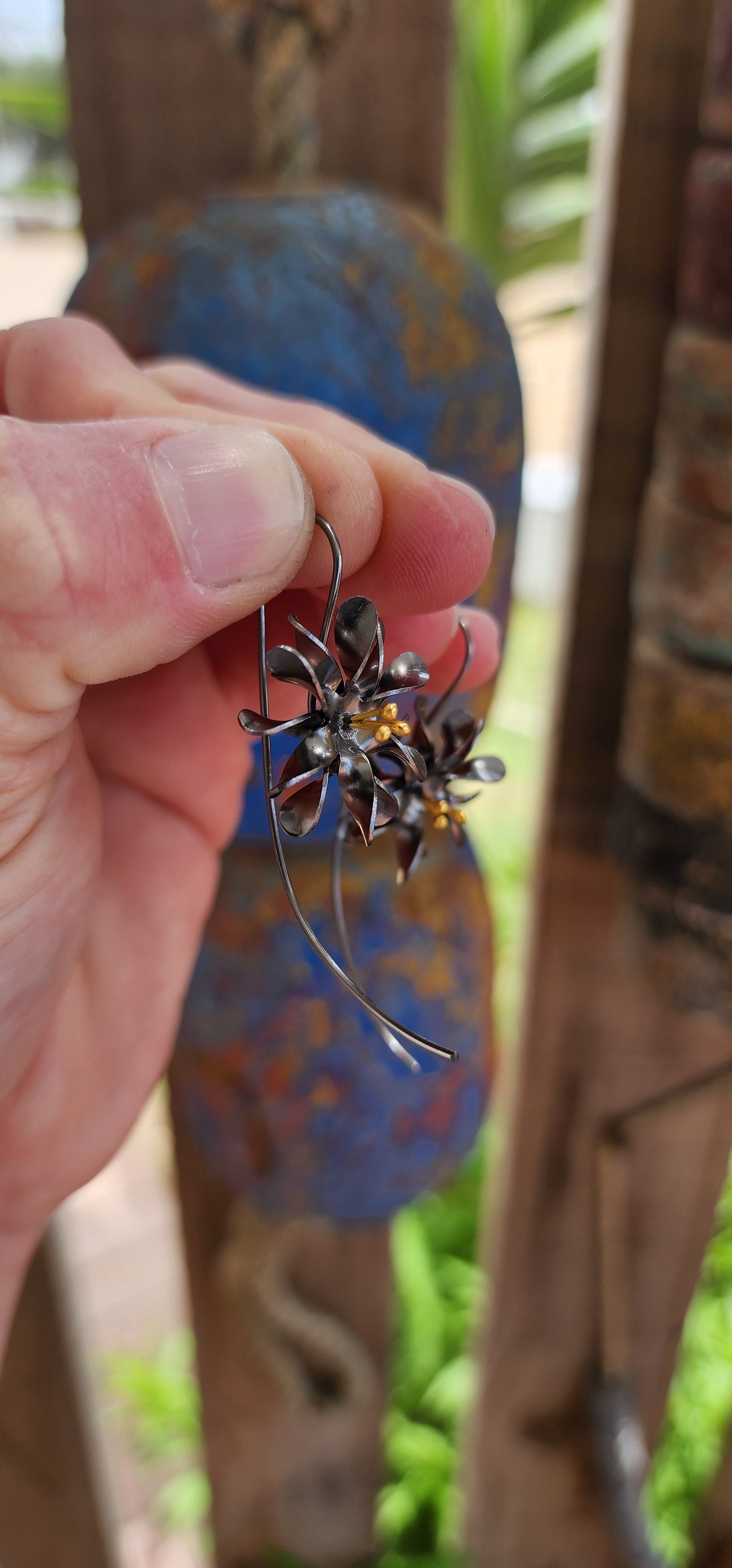 These stunning artisan-crafted earrings are a wearable botanical dream!