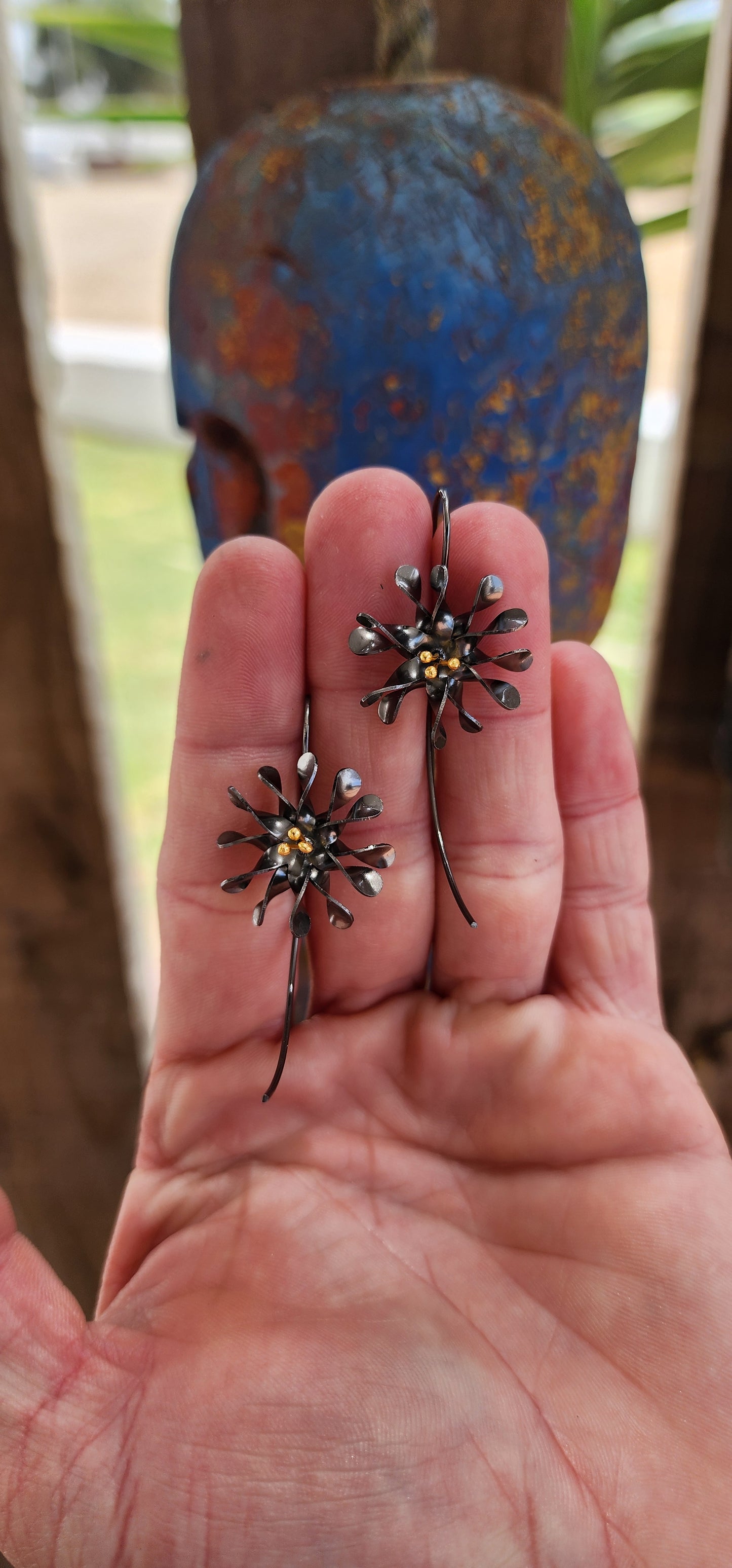 These stunning artisan-crafted earrings are a wearable botanical dream!