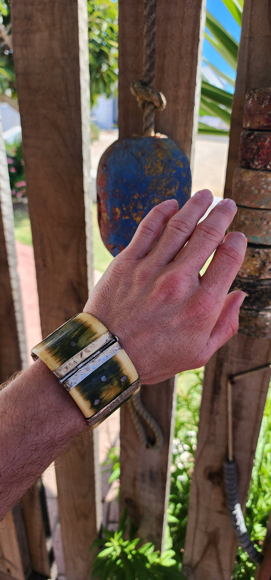 This chunky antique ethnic/tribal pre-ban Ivory cuff bangles is an extraordinary examples of craftsmanship, history, and symbolic power.