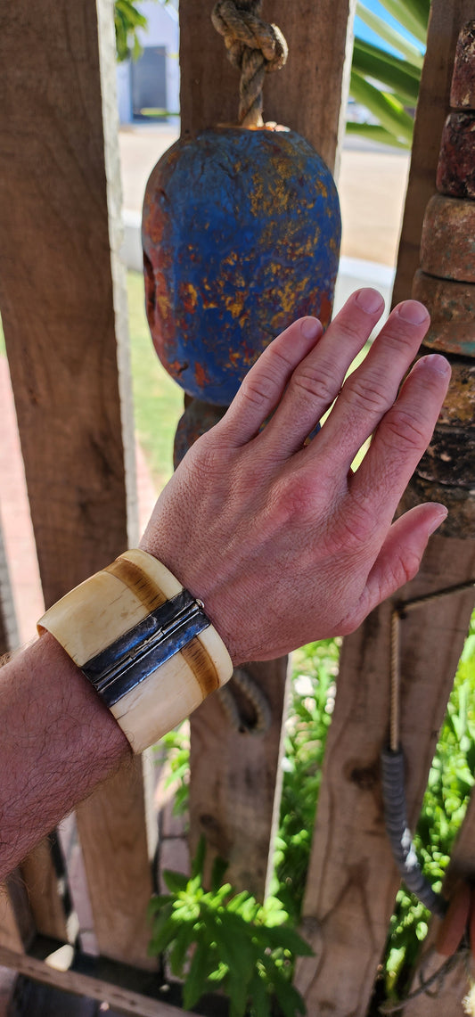 This chunky antique ethnic/tribal pre-ban Ivory cuff bangles is an extraordinary examples of craftsmanship, history, and symbolic power.