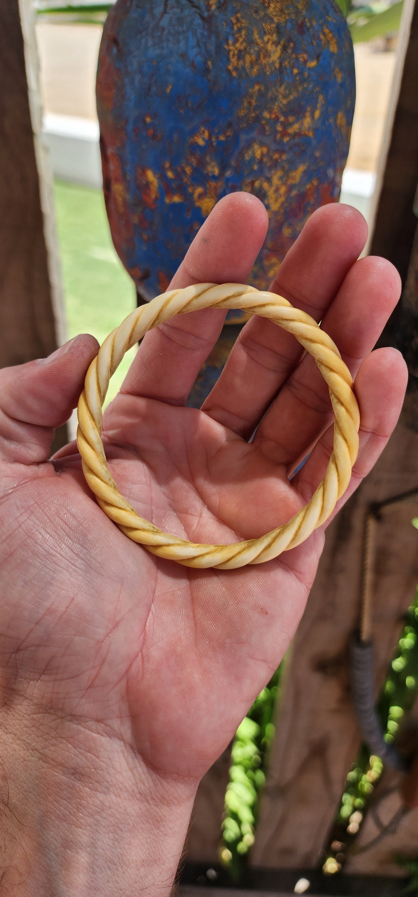 This antique pre-ban hand-carved ivory bangle is a remarkable example of skilled craftsmanship and timeless beauty.