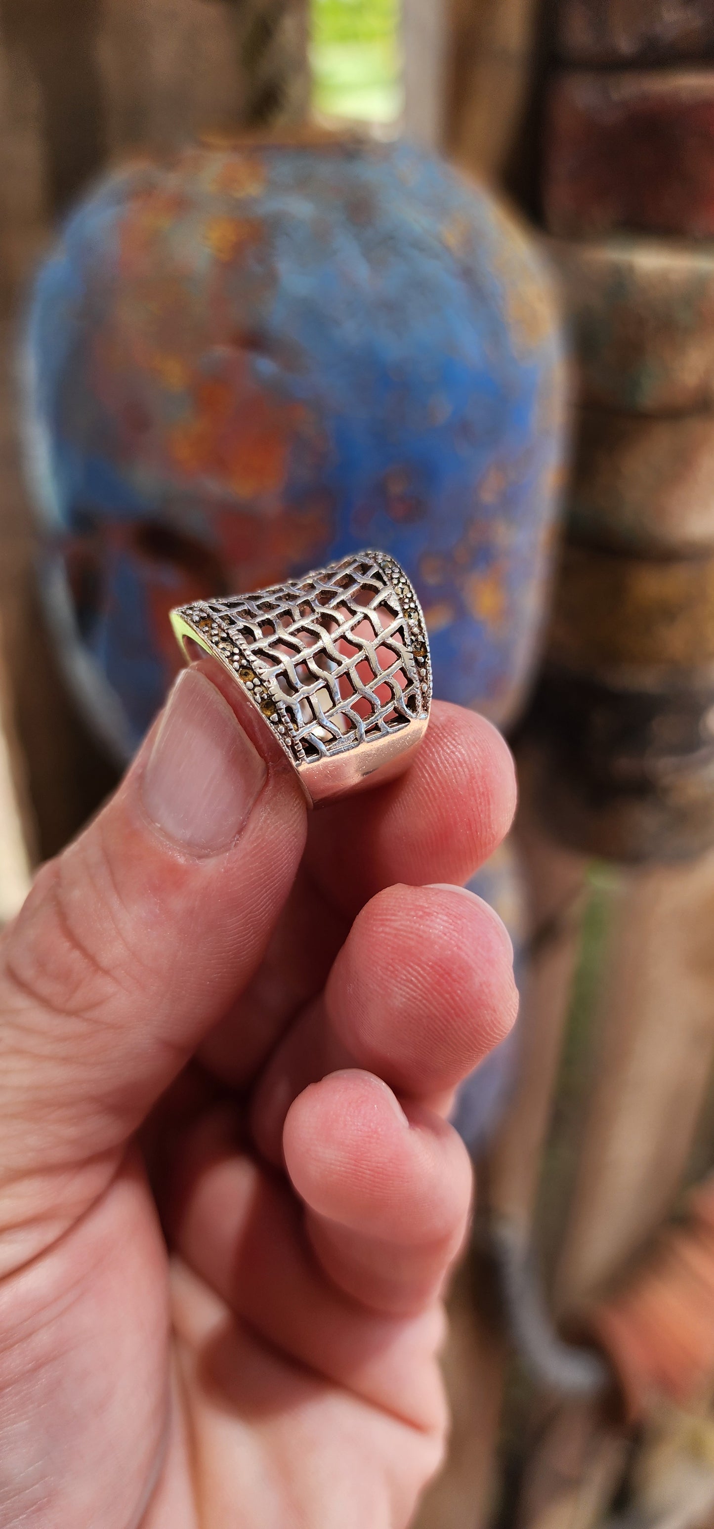 This chunky vintage sterling silver concave dome ring is a statement piece with a story to tell! Its fishnet filigree pierced pattern gives it a delicate, lacy effect while still maintaining a bold and substantial presence.