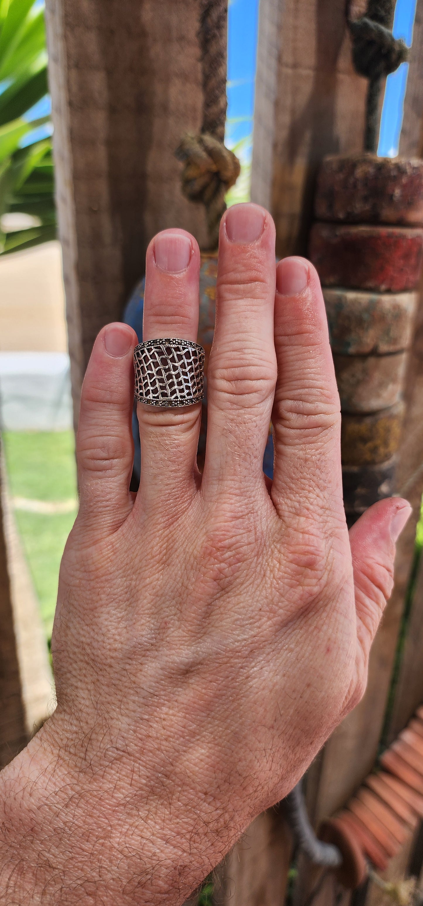 This chunky vintage sterling silver concave dome ring is a statement piece with a story to tell! Its fishnet filigree pierced pattern gives it a delicate, lacy effect while still maintaining a bold and substantial presence.