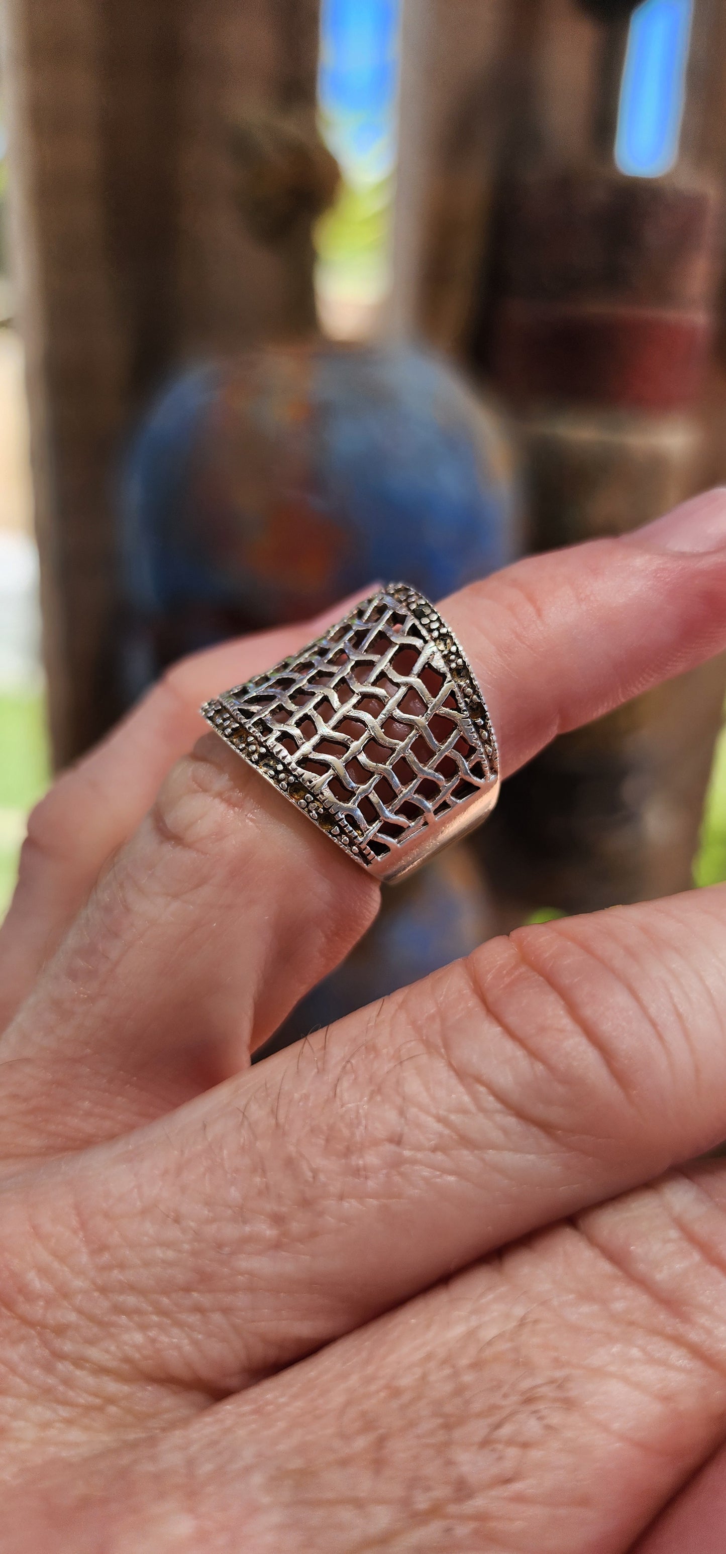 This chunky vintage sterling silver concave dome ring is a statement piece with a story to tell! Its fishnet filigree pierced pattern gives it a delicate, lacy effect while still maintaining a bold and substantial presence.
