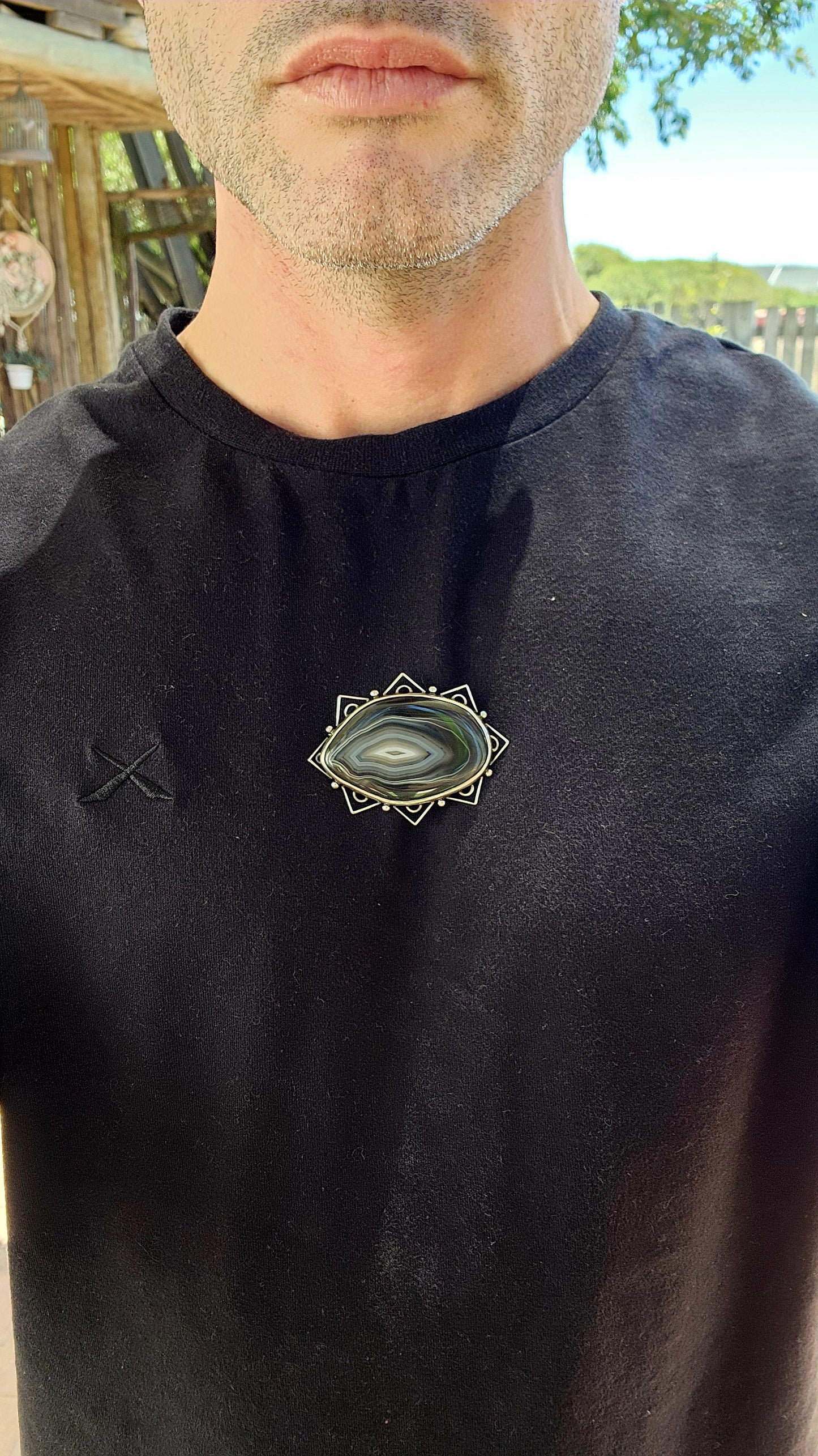 This vintage mid-century sterling silver and banded agate brooch is a true statement piece—bold, earthy, and steeped in artistic craftsmanship.