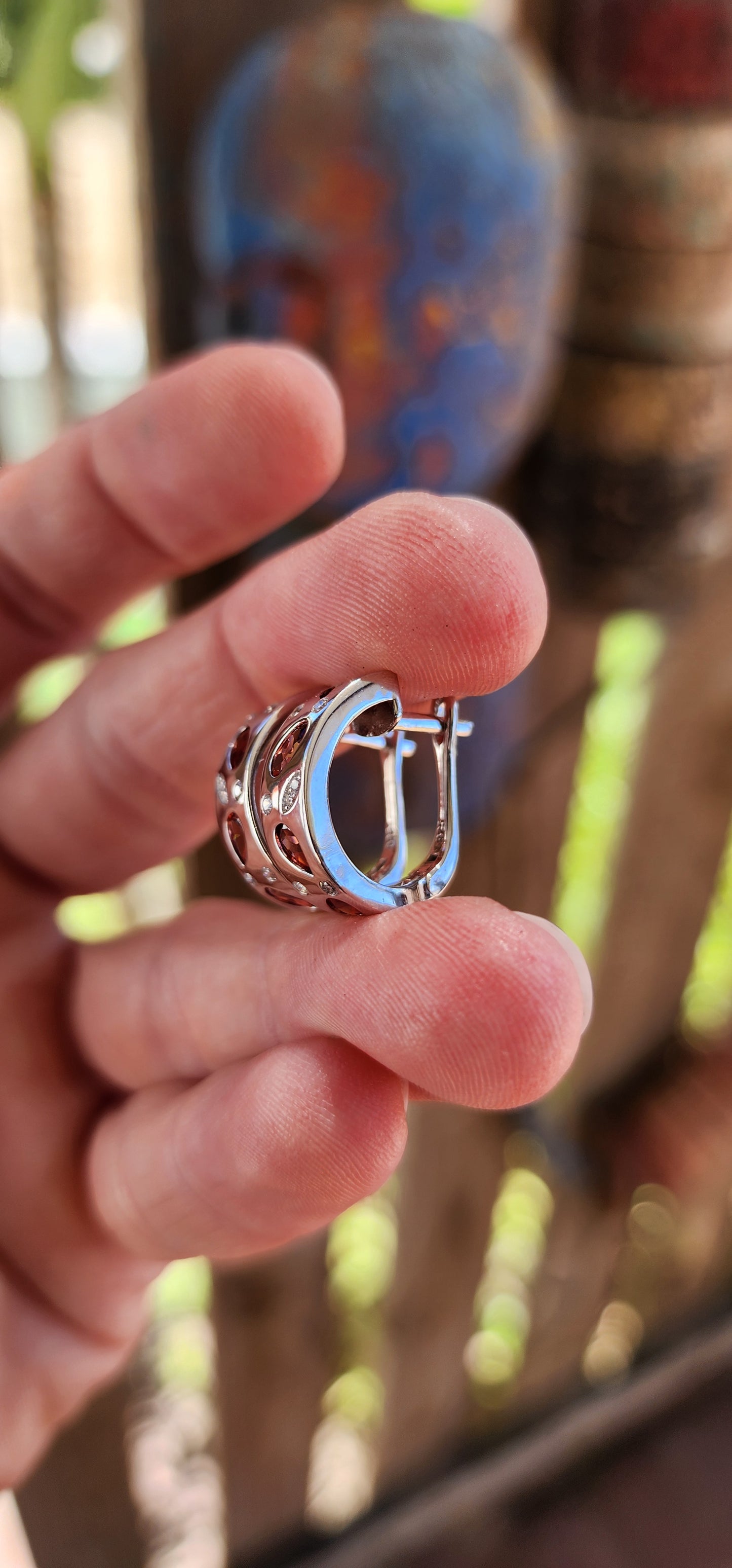 These sterling silver half-hoop earrings are absolutely stunning, designed for those who appreciate both beauty and practicality. Their graceful half-hoop silhouette allows them to dangle effortlessly, striking the perfect balance.