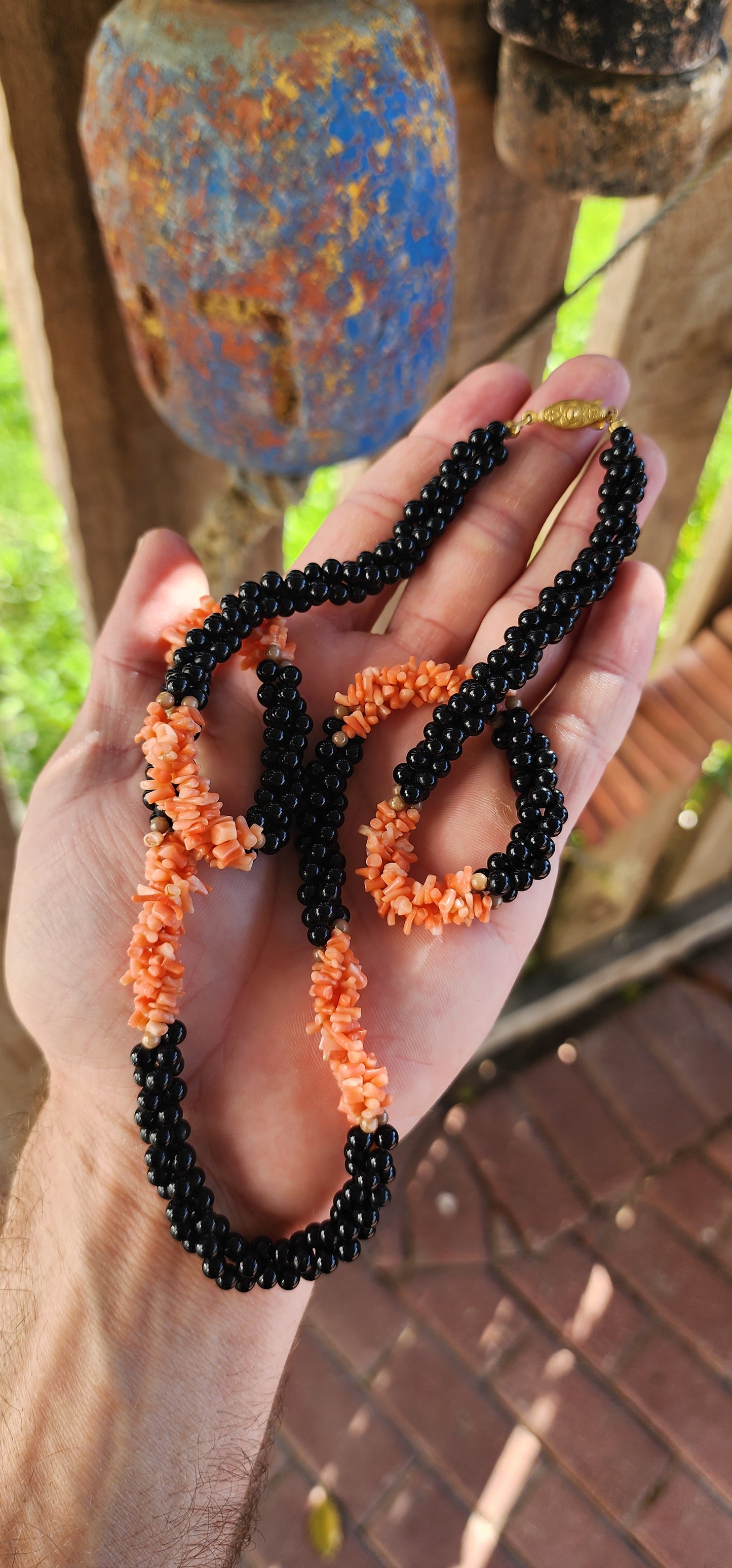 Step into the bold elegance of vintage 1970s flair with this sensational extra-length twist necklace, a true statement piece that fuses natural beauty with retro sophistication.