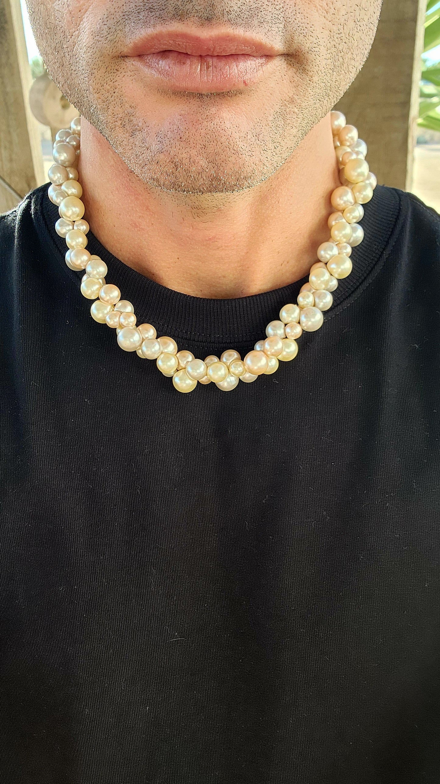 This playful vintage 1980s faux pearl necklace is what happens when elegance decides to let its hair down and throw a garden party! Featuring a joyous jumble of creamy vanilla, dreamy dove-grey, and soft peach faux pearls.