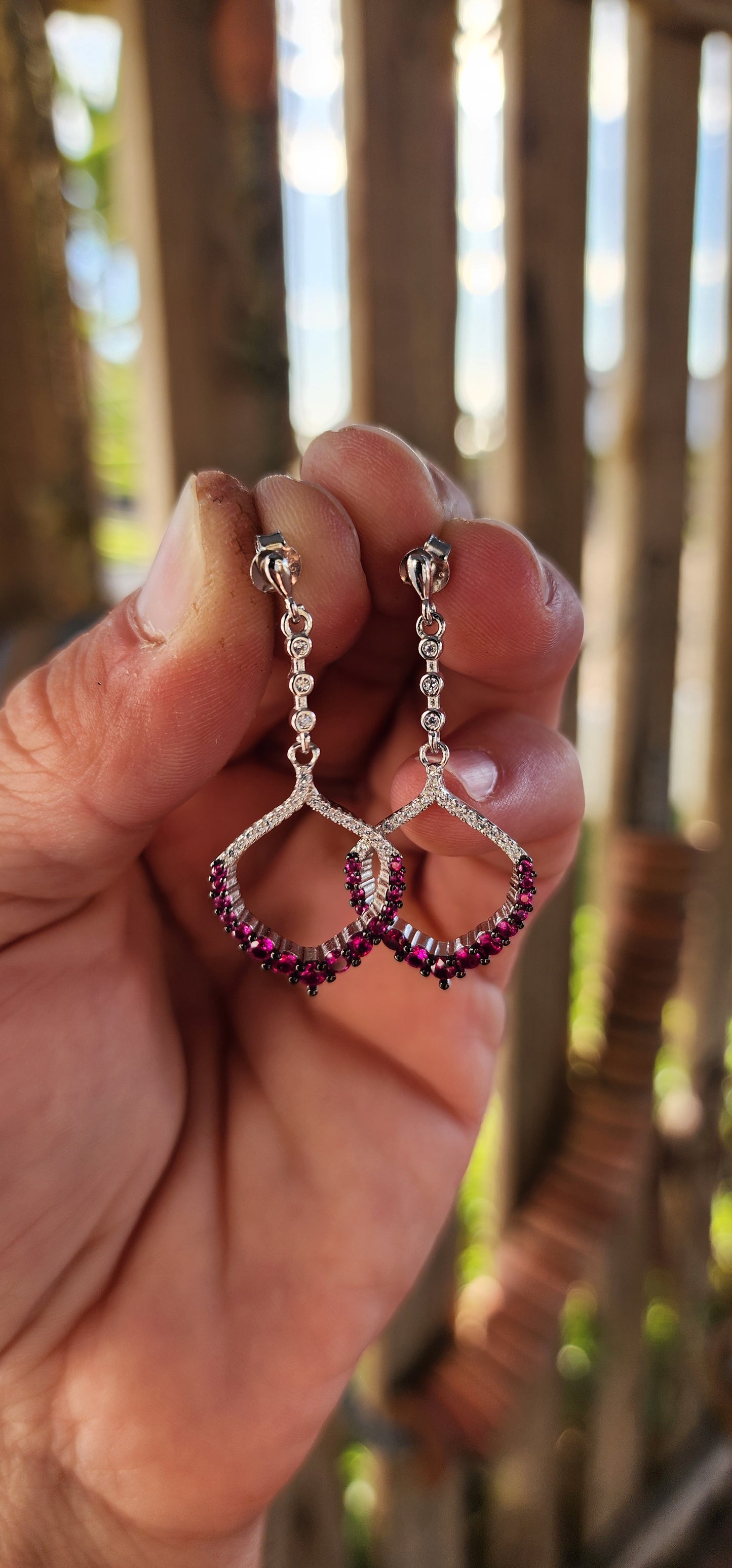 These dazzling drop earrings are where playful charm meets red carpet elegance.