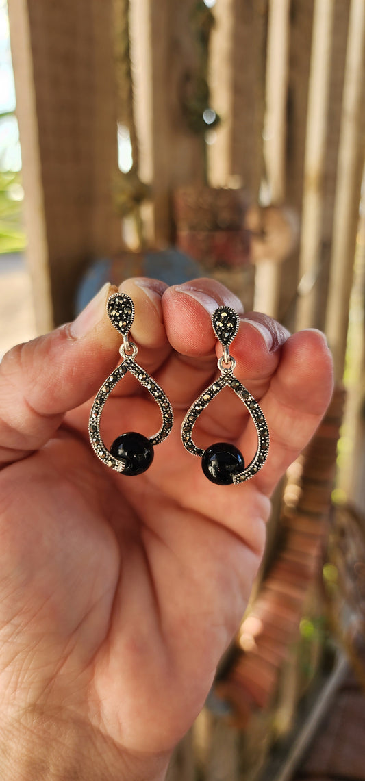 These elegant sterling silver dress earrings are pure Art Deco style fantasy — equal parts sophistication, geometry, and a touch of mystery.
