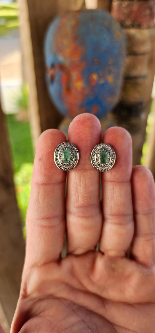 Step into timeless elegance with this dazzling pair of sterling silver earrings — a sophisticated symphony of shimmer and style that whispers of vintage charm with a fresh, modern flair.