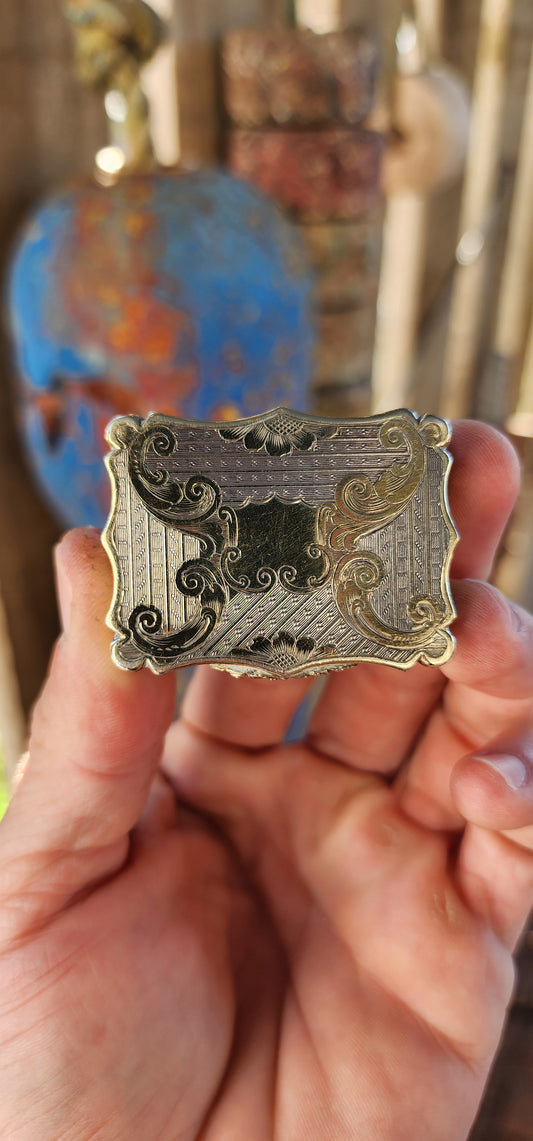 This exquisite silver-gilt vinaigrette box is a hallmark example of the craftsmanship of Nathaniel Mills, one of the most celebrated English silversmiths of the 19th century. Created around 1843 during the early Victorian era.