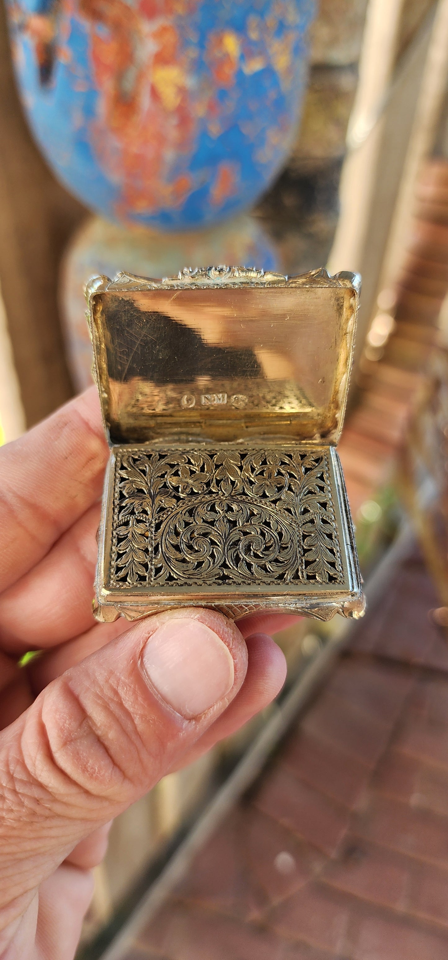 This exquisite silver-gilt vinaigrette box is a hallmark example of the craftsmanship of Nathaniel Mills, one of the most celebrated English silversmiths of the 19th century. Created around 1843 during the early Victorian era.