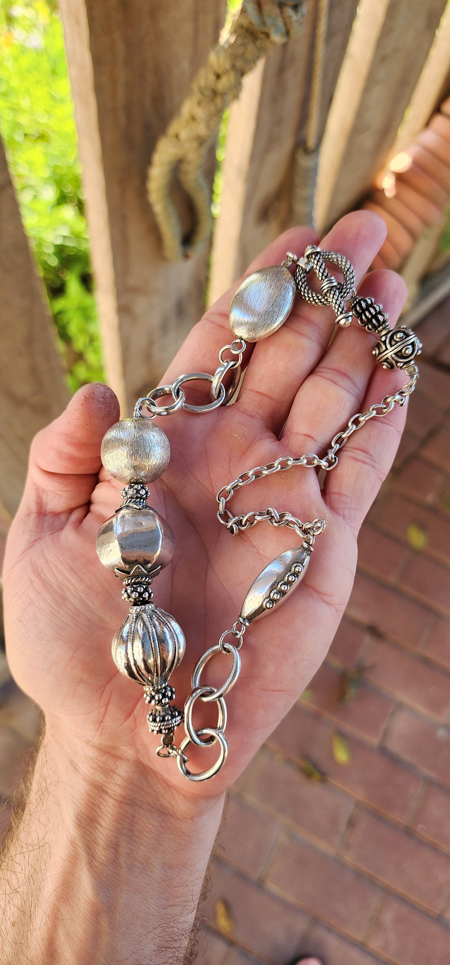 Step into the spotlight with this marvelous artisan-crafted sterling silver statement necklace, a piece that wears like a wearable sculpture and radiates confident, worldly elegance.