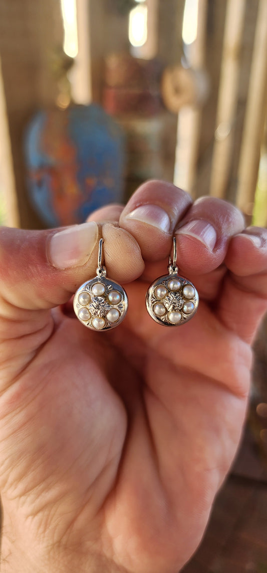 These exquisite late Victorian-era earrings are a delicate echo of nature’s eternal motifs, rendered in precious materials that were beloved during the golden age of sentiment and symbolism in jewelry.