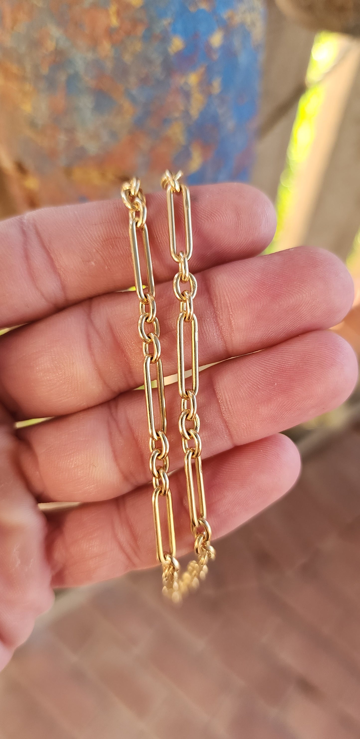 Say hello to a slice of wearable history — a fabulous antique fob chain that marries timeless sophistication with unmistakable golden swagger.This striking beauty is composed entirely of solid 18ct buttery yellow gold.