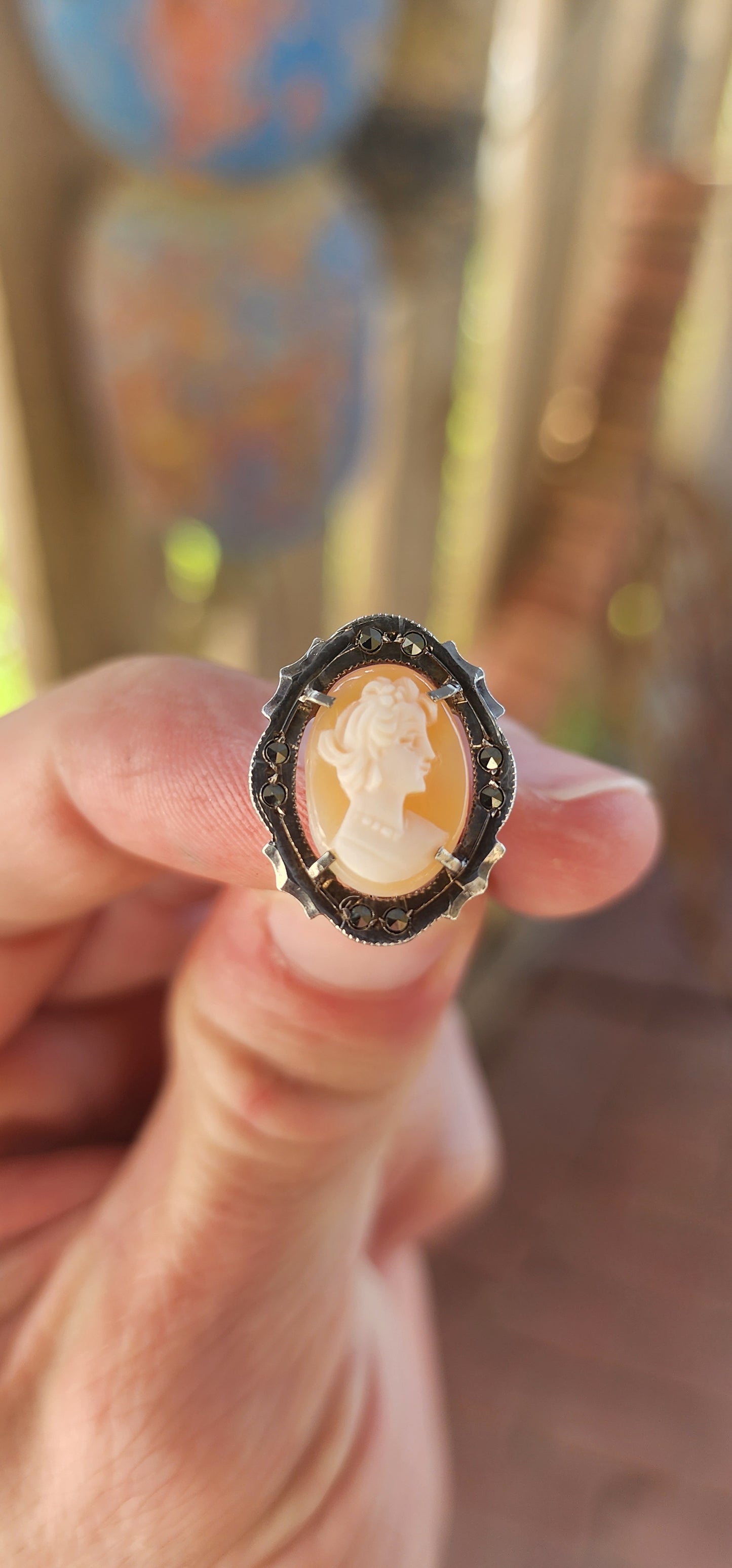 A pair of vintage Italian 800 Silver and Conch Shell Cameo Clip-On Earrings, Circa 1940's.
Gracefully embodying the timeless elegance of Belle Époque refinement, this exquisite pair of vintage earrings is a masterclass in classical ornamentation.