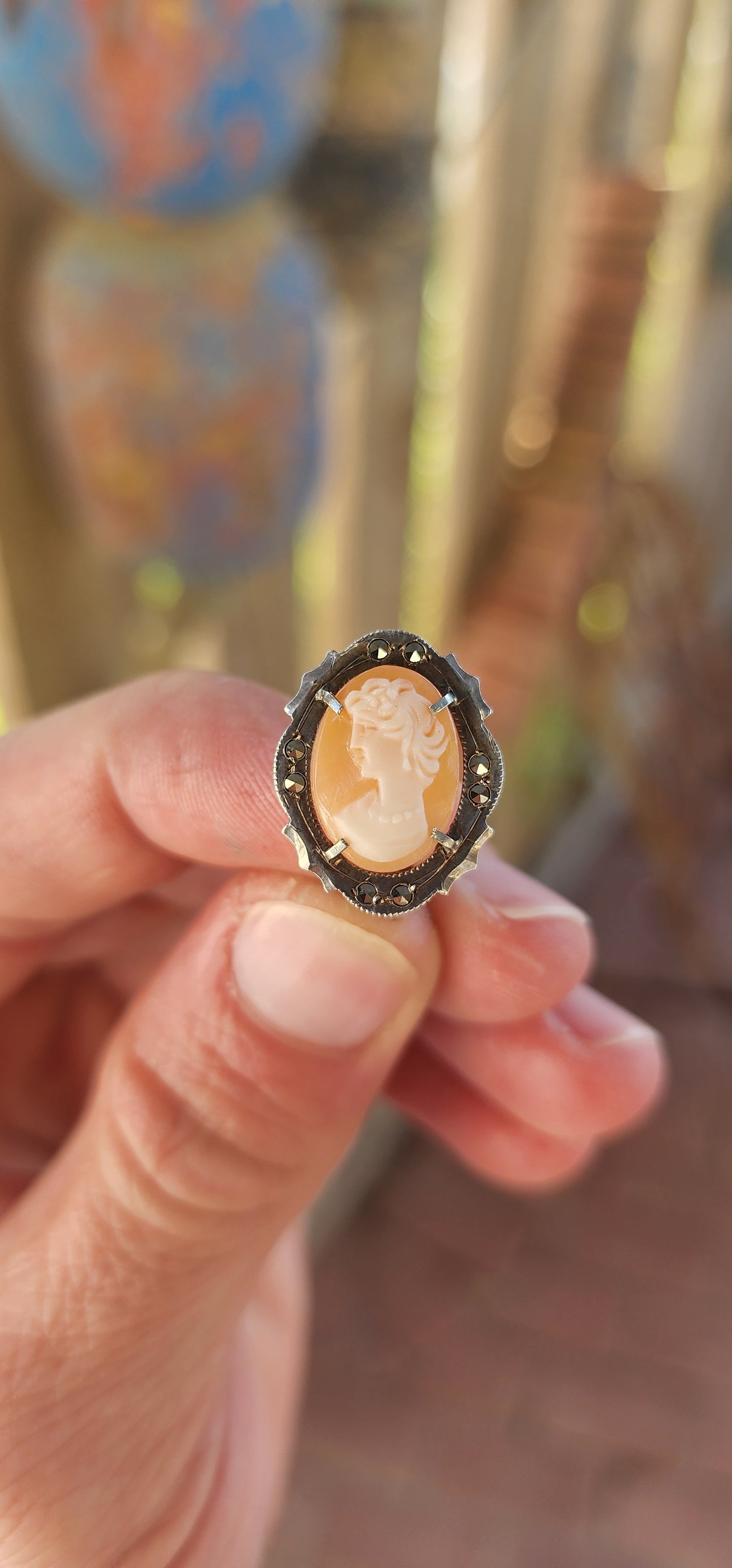 A pair of vintage Italian 800 Silver and Conch Shell Cameo Clip-On Earrings, Circa 1940's.
Gracefully embodying the timeless elegance of Belle Époque refinement, this exquisite pair of vintage earrings is a masterclass in classical ornamentation.