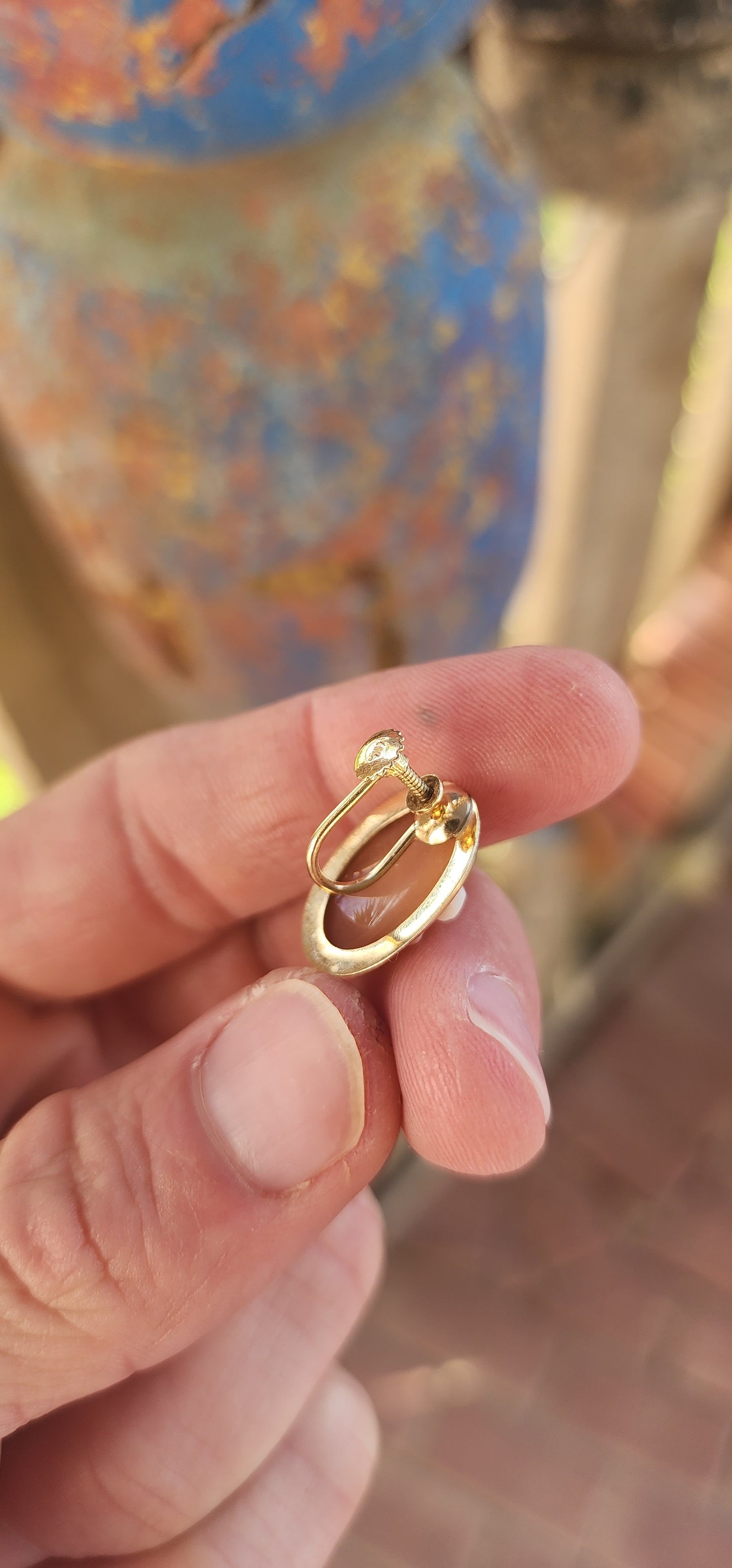 An Exquisite Pair of Mid-Century Carved Conch Shell Cameo Earrings, Circa 1950s.
These enchanting vintage earrings radiate timeless elegance, meticulously handcrafted during the mid-20th century and set in luxurious 14ct yellow gold.
