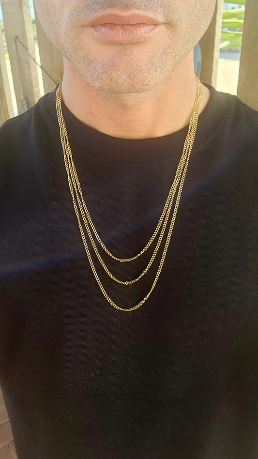 Behold this spectacular antique late Victorian-era 14ct yellow gold three-strand curb link chain necklace—a piece that whispers tales of timeless elegance and genteel grandeur.