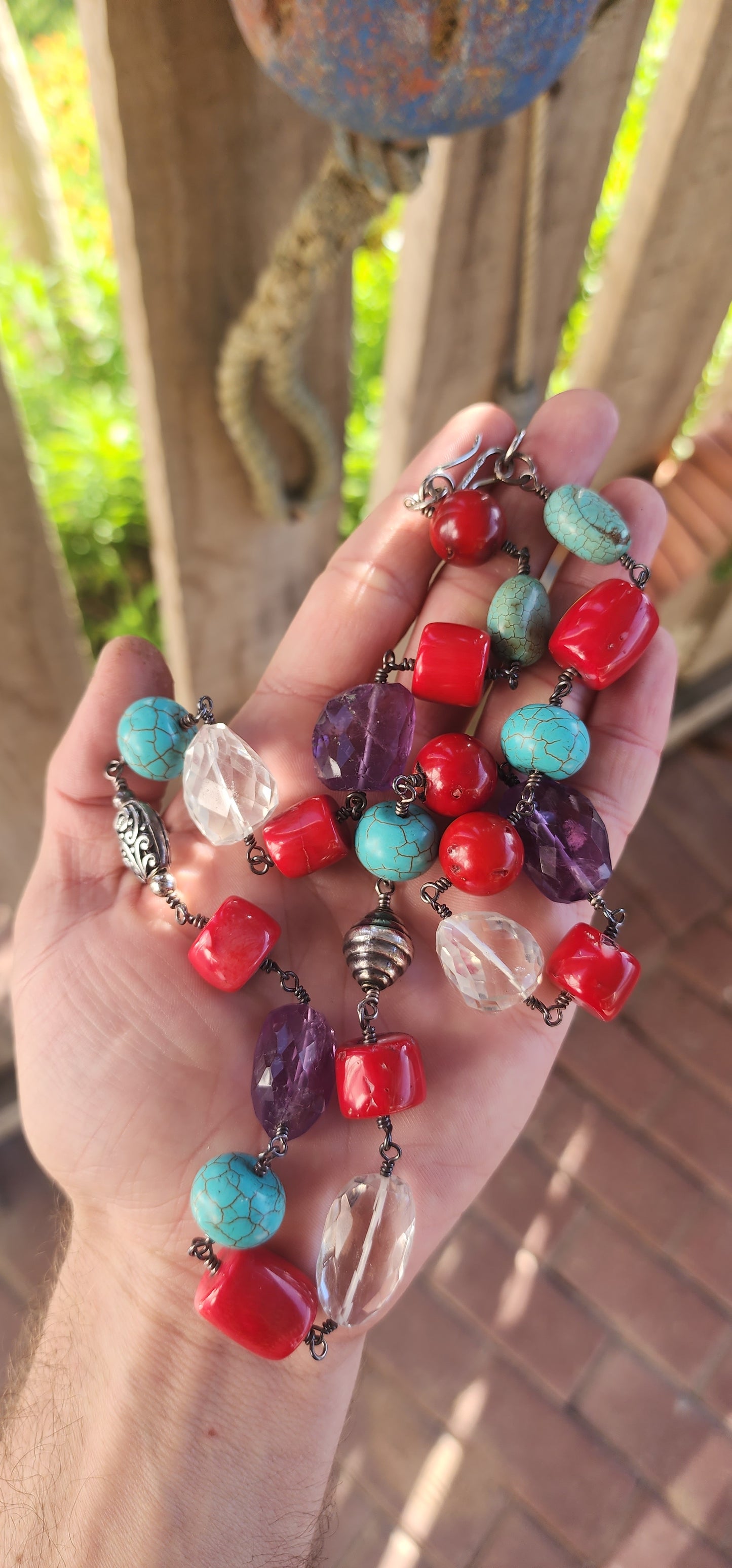 This necklace is a joyous celebration of color, texture, and bohemian artistry—a wearable festival of gemstone delight!