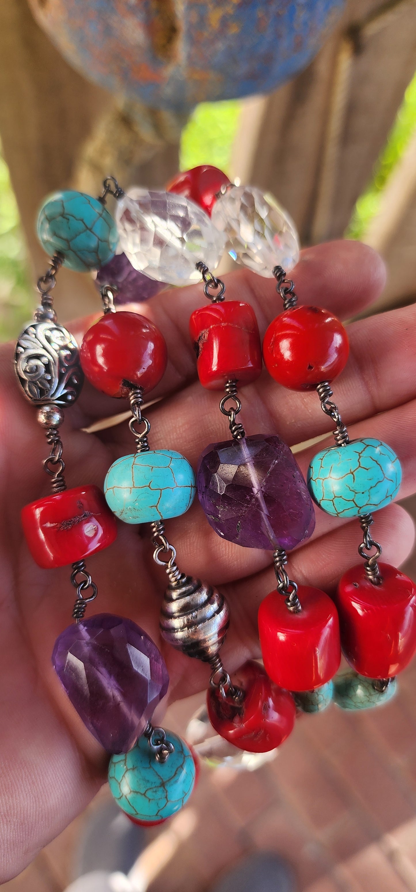 This necklace is a joyous celebration of color, texture, and bohemian artistry—a wearable festival of gemstone delight!