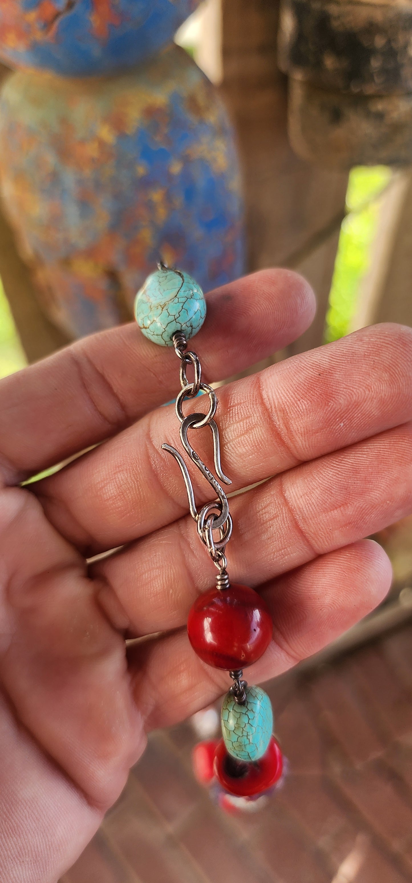 This necklace is a joyous celebration of color, texture, and bohemian artistry—a wearable festival of gemstone delight!