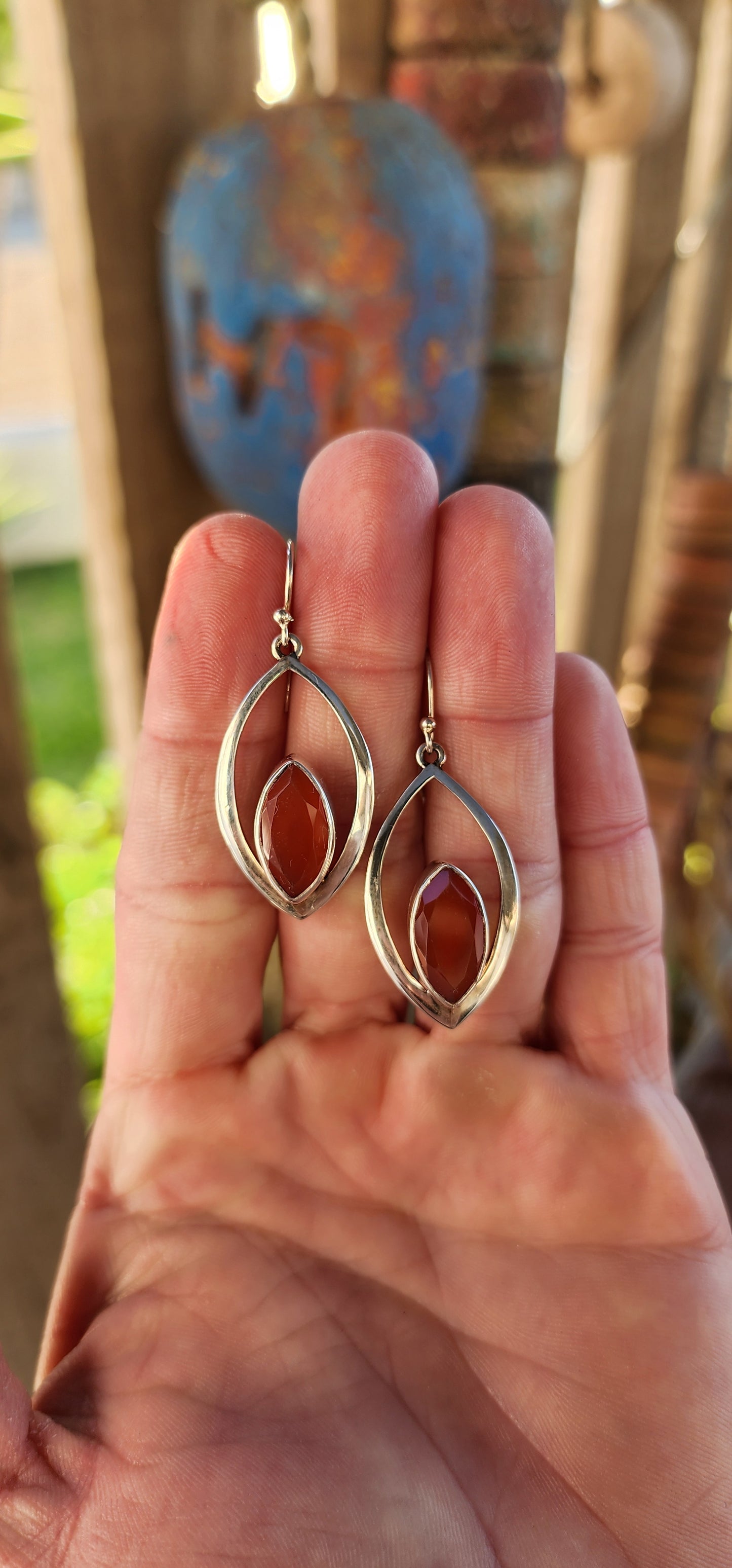 These earrings are like miniature sculptures—modernist marvels that flirt with geometry and gemstone magic!