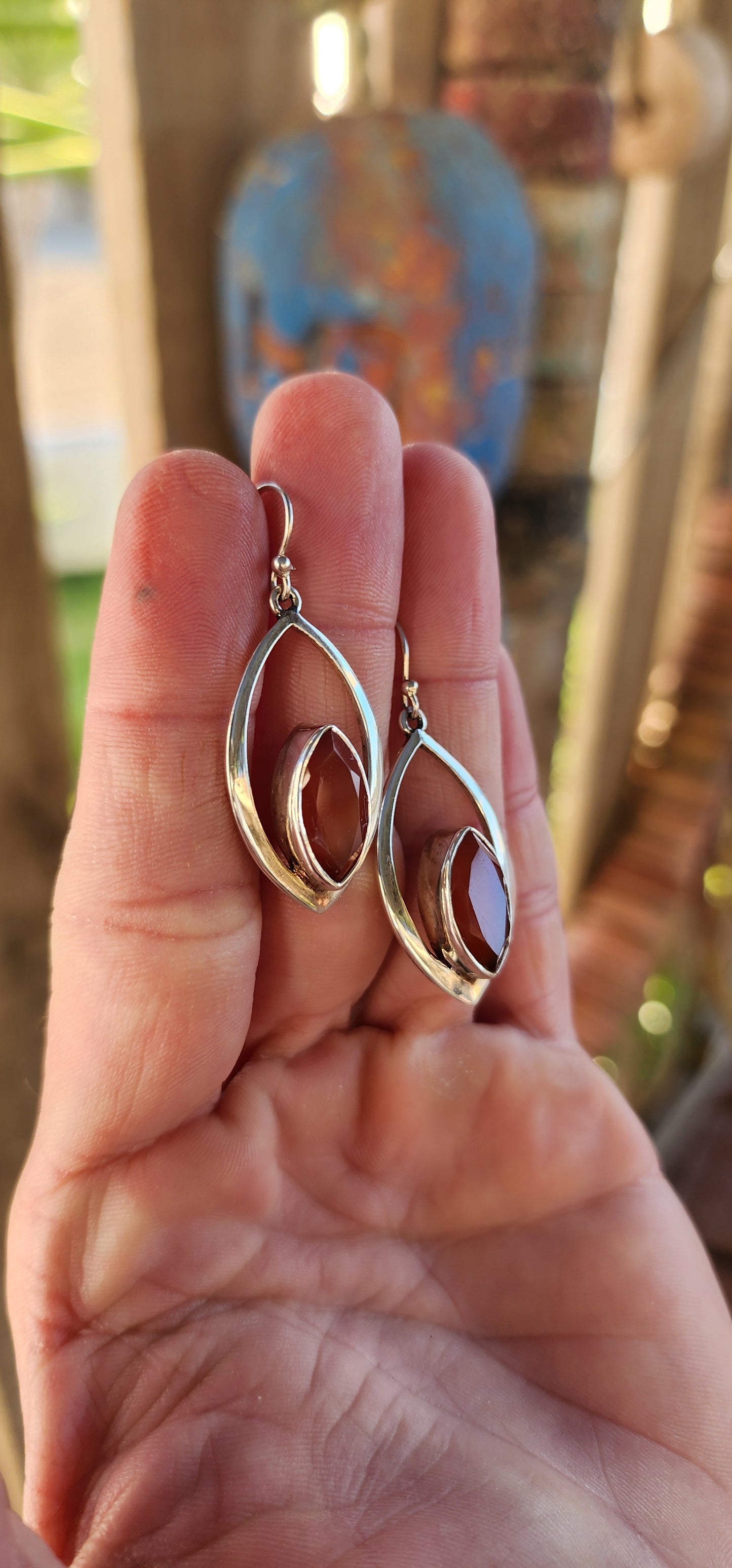 These earrings are like miniature sculptures—modernist marvels that flirt with geometry and gemstone magic!