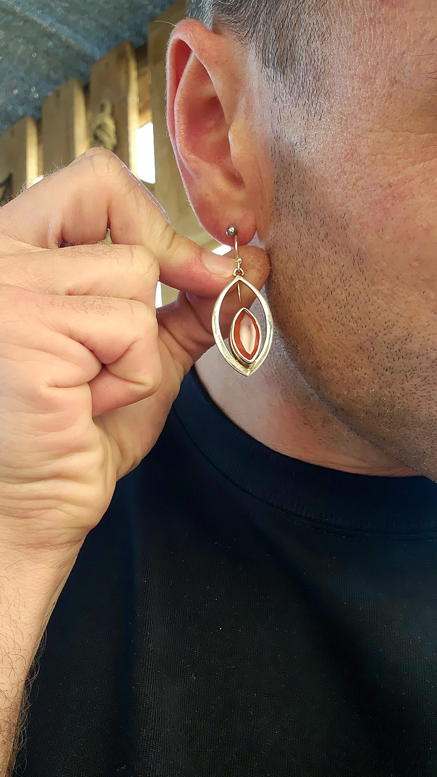 These earrings are like miniature sculptures—modernist marvels that flirt with geometry and gemstone magic!