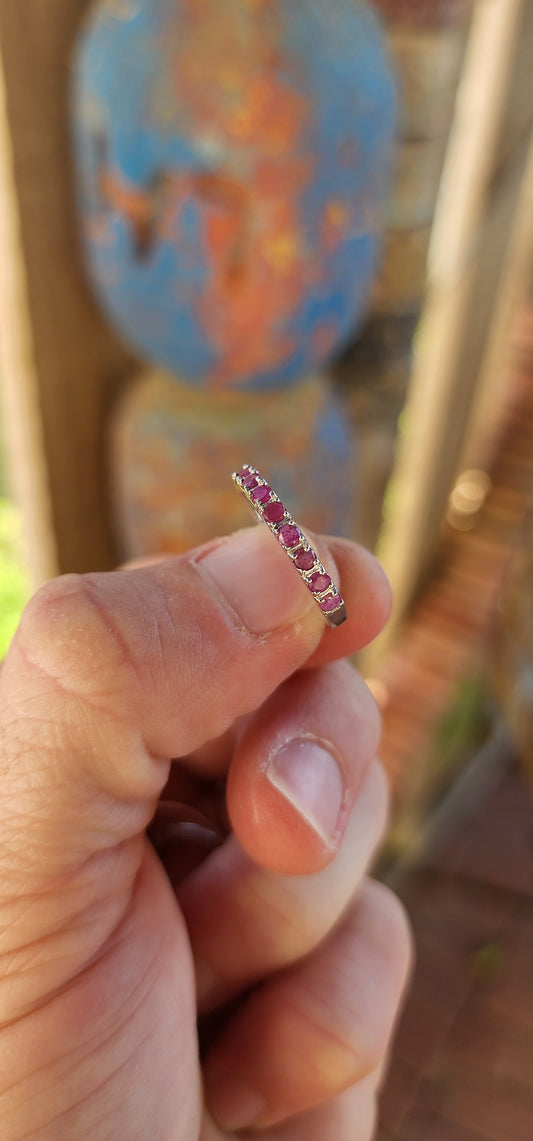 STACK 'EM HIGH – Sterling Silver Gemstone Eternity Bands!
Why settle for just one gem when you can indulge in a cascade of color and symbolism? These sterling silver half-eternity stacking rings are slim, stunning, and made to be mixed.