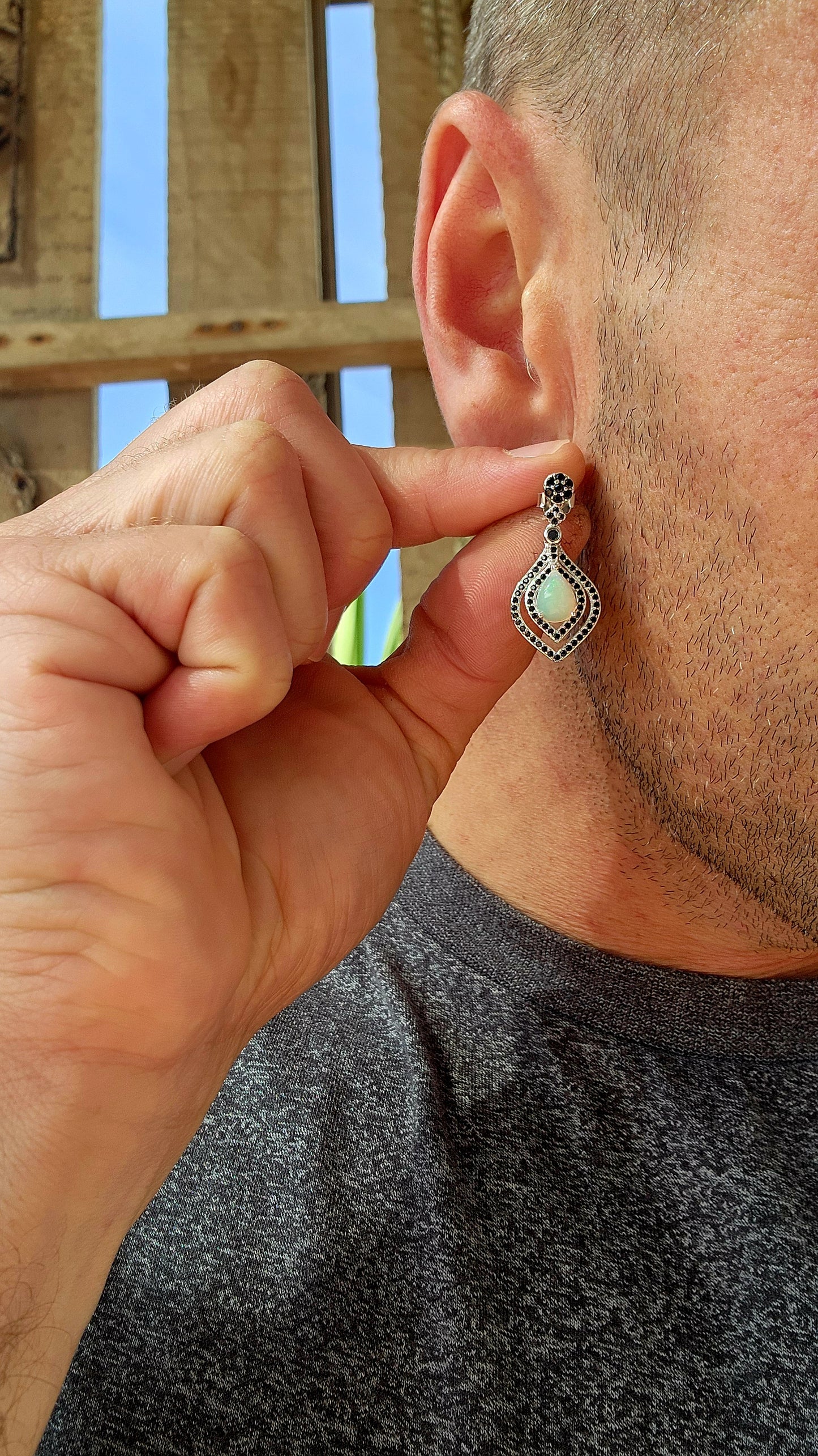 Opal Reverie – A Dance of Fire and Shadow!
Drape your ears in mystique with these absolutely showstopping sterling silver drop earrings, where celestial shimmer meets gothic glamour!