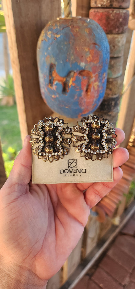 Hold on to your shoulder pads, because these clip-on earrings are bringing back the unapologetic drama of the 1980s — with extra flair!