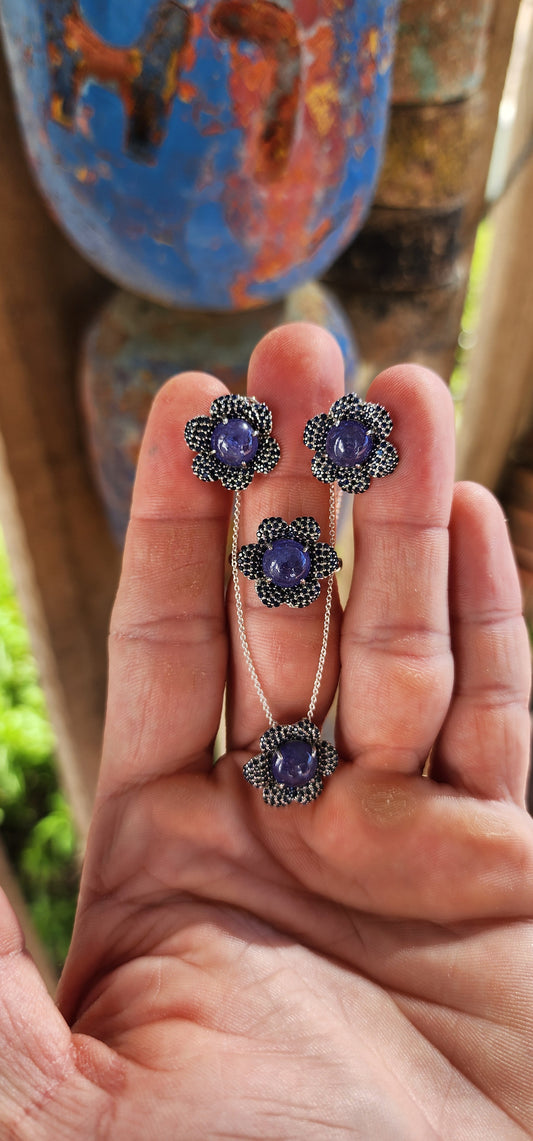Straight from the heart of an enchanted glade where moonlight dances through violet mist and faeries whisper secrets into dew-drenched petals, comes this utterly magical sterling silver jewelry set—a treasure surely spun by woodland enchantresses.