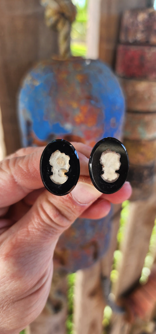 Beautiful and generous-sized pair of vintage clip-on earrings from the mid-20th century, when classical elegance saw a magnificent resurgence.